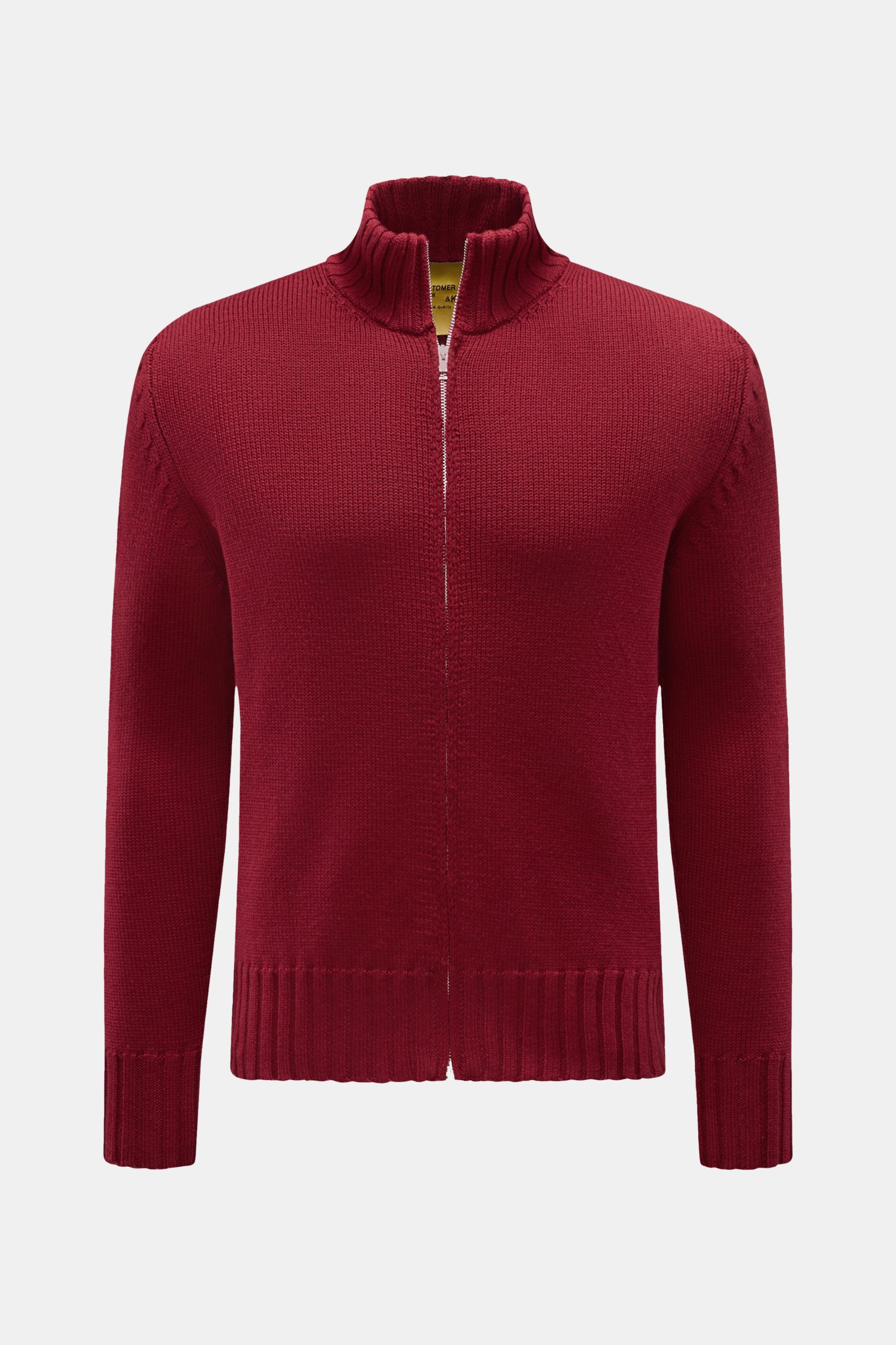 Front view of the B.F. Knitwear Merino Strickjacke dunkelrot, a slim fit, dark red cardigan made of pure merino wool with a soft touch, medium knit texture, two-way zipper, stand-up collar, round neckline, and comfortable ribbed cuffs. Hochwertiger All