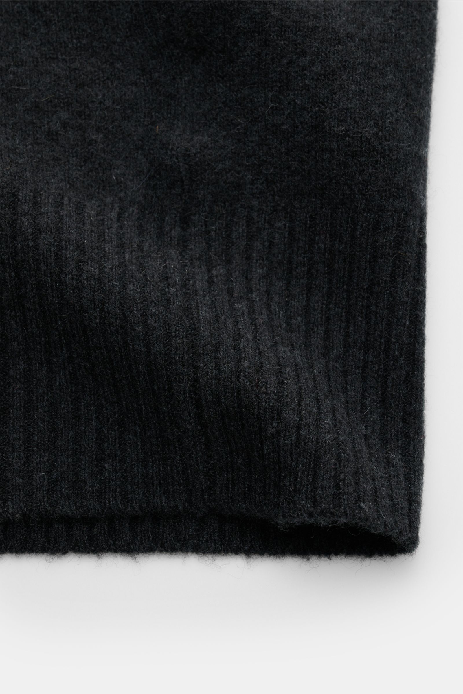 Alt tag (125 characters max): Close-up of FTC Cashmere cardigan anthracite showing soft ribbed knit fabric and texture from a flat-lay perspective.

Description: 
This luxurious cardigan by eco-friendly knitwear label FTC is a soft knitwear essential i