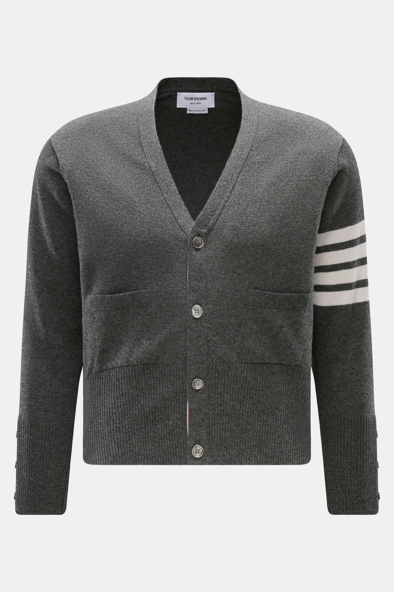 Front view of Thom Browne Cashmere Cardigan dunkelgrau meliert in dark gray melange, featuring pure cashmere, soft touch, fine knit, regular fit, button placket, patch pockets, wide rib cuffs, and buttoned side slits.