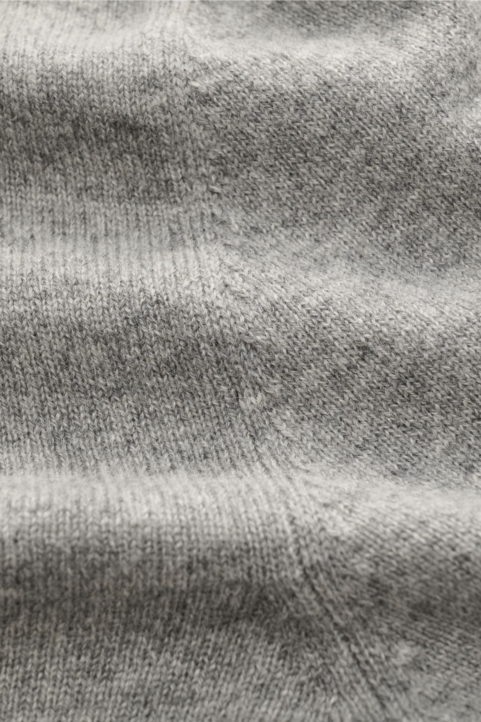 Close-up front view of Bruno Manetti Cashmere cardigan grey melange showing pure cashmere, soft feel, fine knit, regular fit, V-neck, six-button placket, and comfortable ribbed bands.