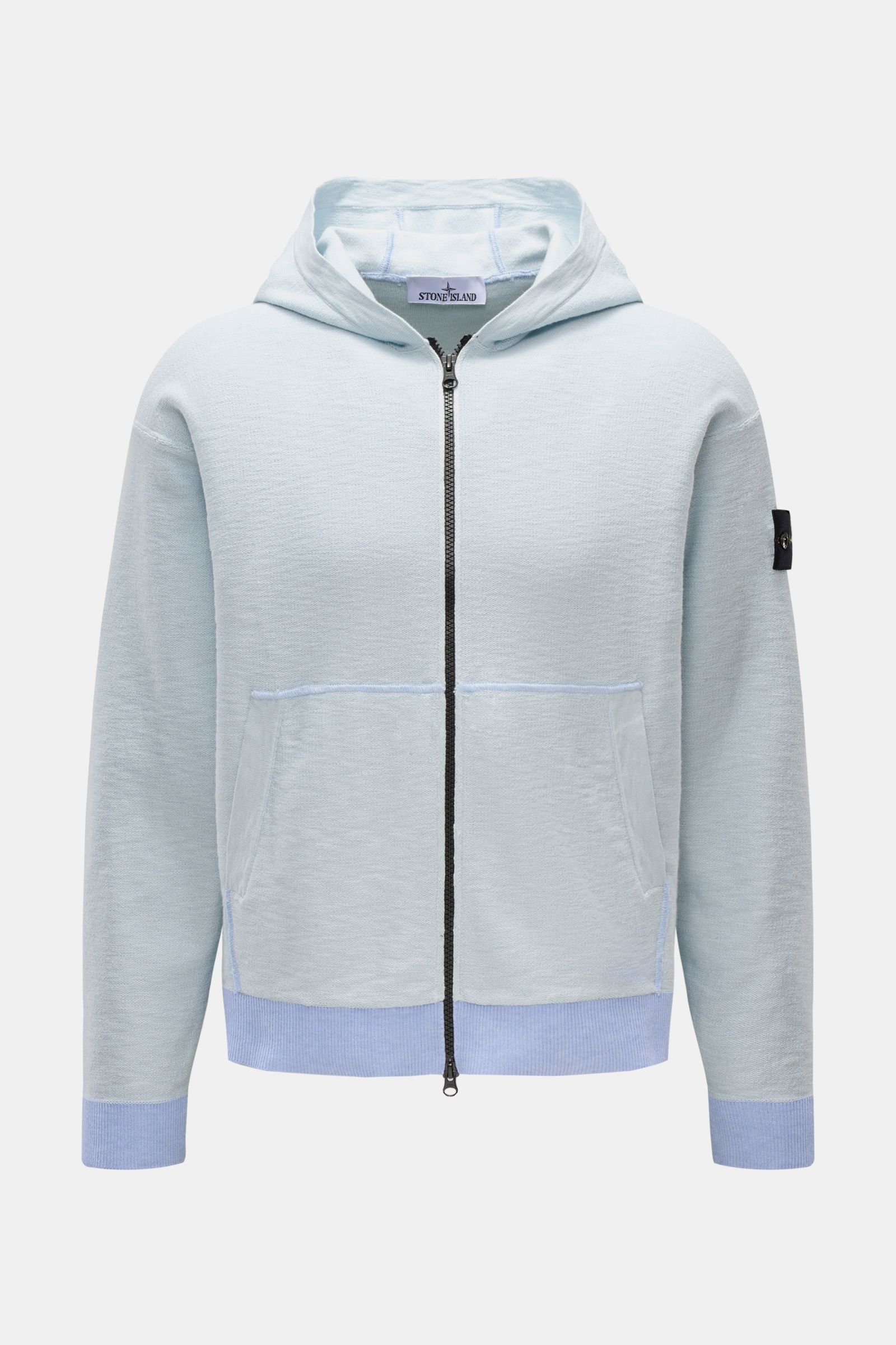 Front view of a Stone Island Sweatjacke pastellblau, a sporty hooded zip-up jacket in modern left-knit structure, made from a cotton and microfiber blend. Features a regular fit, split kangaroo pockets, rib-knit cuffs and hem, a slightly textured feel, an
