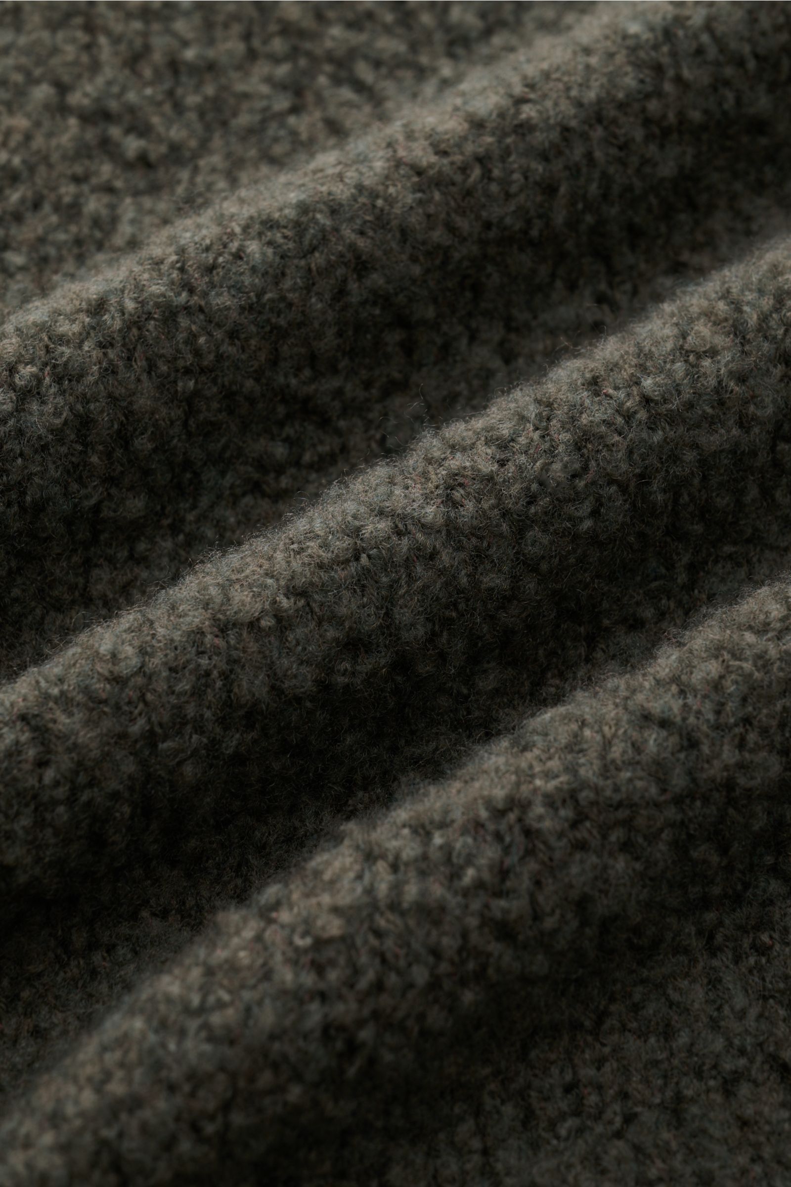 Close-up front view of the 04651/ A trip in a bag Cardigan 'Chunky Overshirt' olive, showing its soft, voluminous knit texture.

Description: Smart and relaxed: This cardigan in overshirt style by 04651/ A TRIP IN A BAG is a perfect layering piece for 