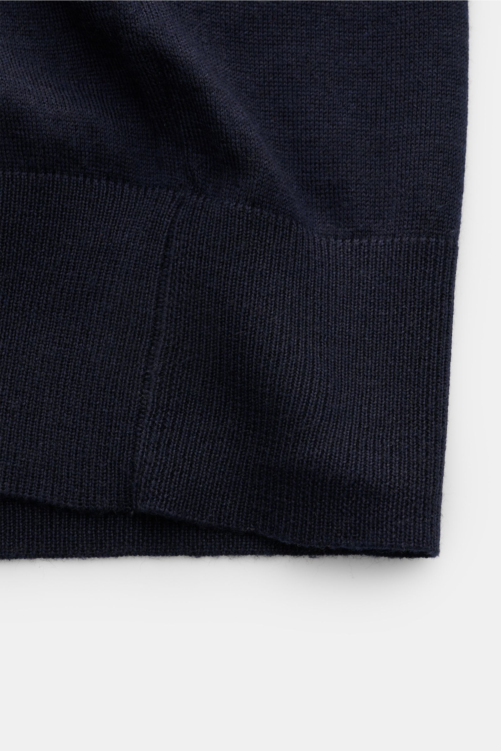 Bruno Manetti Cashmere-silk cardigan navy shown in a close-up bottom hem view, highlighting the very soft, fine knit fabric with comfortable ribbed bands. Luxury you can feel on your skin: This fine knit cardigan by BRUNO MANETTI has an exceptionally soft