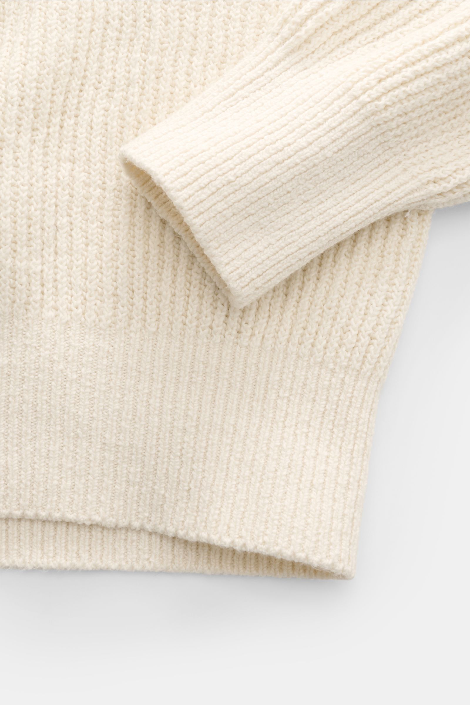 Close-up front view of the Brunello Cucinelli Cardigan cream showing the textured brioche knit and ribbed sleeve cuffs.

BRUNELLO CUCINELLI adds luxury to your casual wardrobe with this cardigan in brioche knit in soft cotton enhanced with a practical 