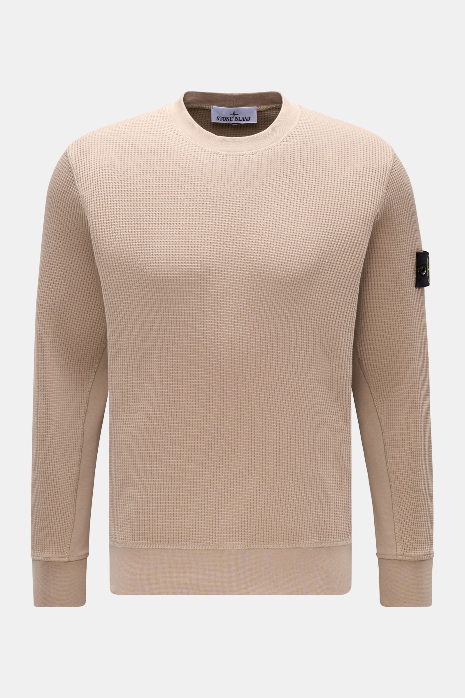 Front view of Stone Island Rundhalspullover 'Waffle' taupe, a slim fit waffle-knit cotton sweatshirt with round neckline, cuffed sleeves, sweat fabric inserts, and compass badge on upper arm.

Additional description: Basic Piece mit Twist: Dieser Pullo