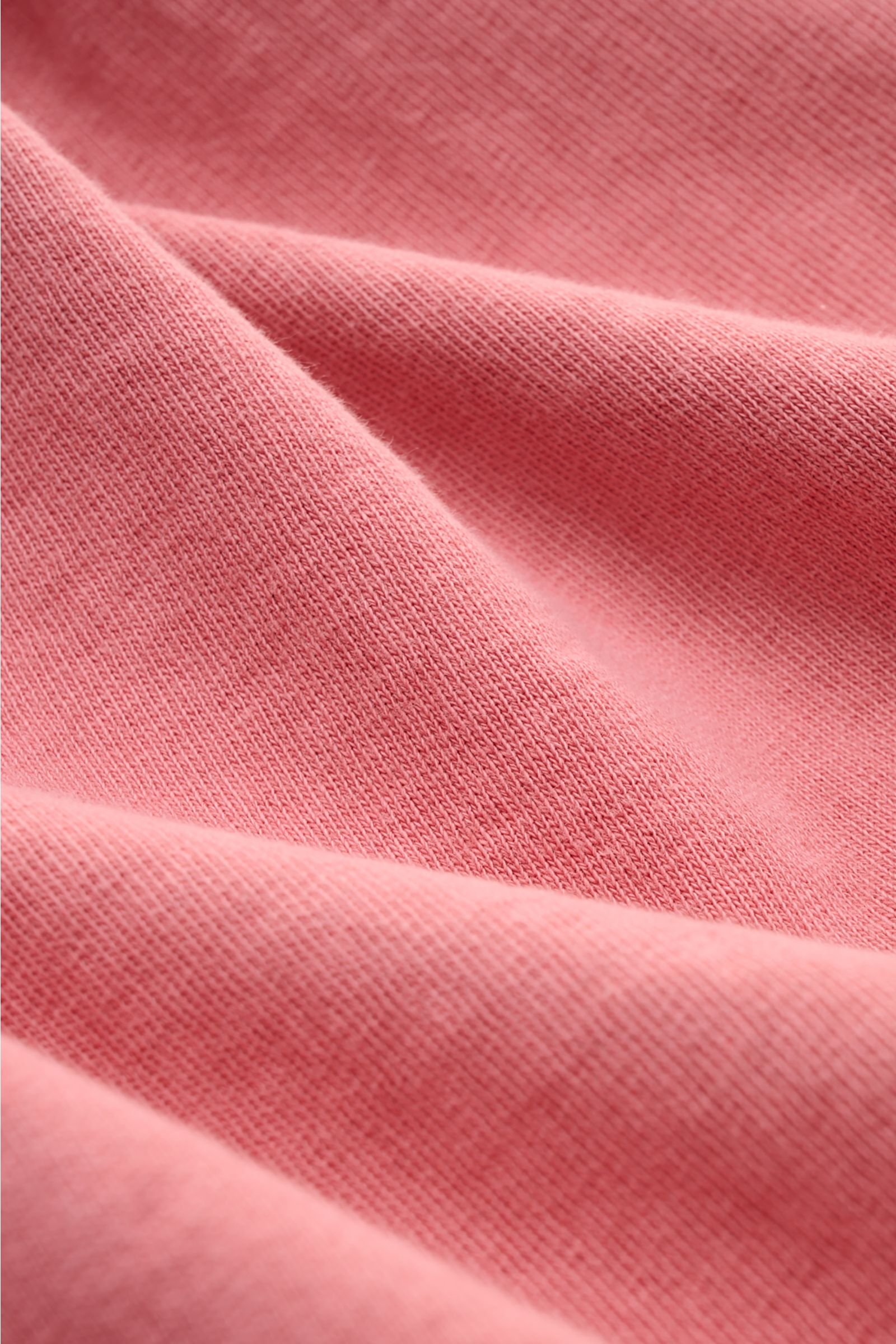 Close-up front view of Stone Island Crew neck sweatshirt 'Washed Sweat' antique pink showing soft pure cotton fabric with authentic washed effect.

Description: STONE ISLAND’s signature piece dyeing is used with a modern washed effect in this sweatshir