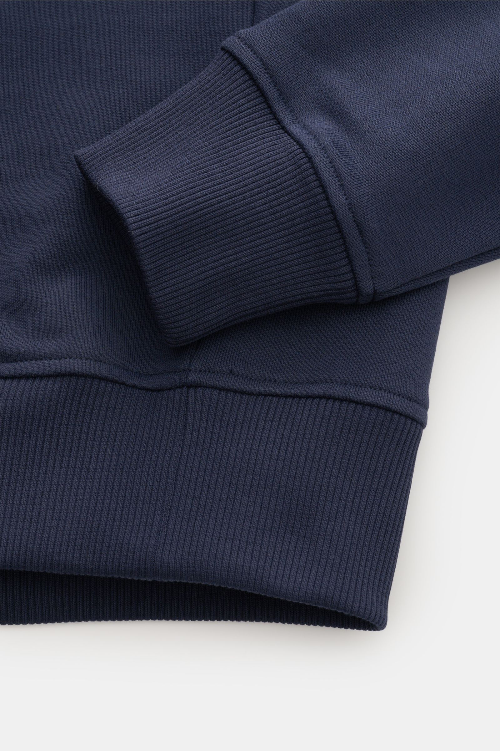 Close-up view of the Ami Paris Crew neck sweatshirt navy showing ribbed cuffs and hem in pure cotton with soft feel and regular fit.

Description:
Comfortable basic: The AMI PARIS sweatshirt in pure cotton is the ideal companion for sporty looks.

