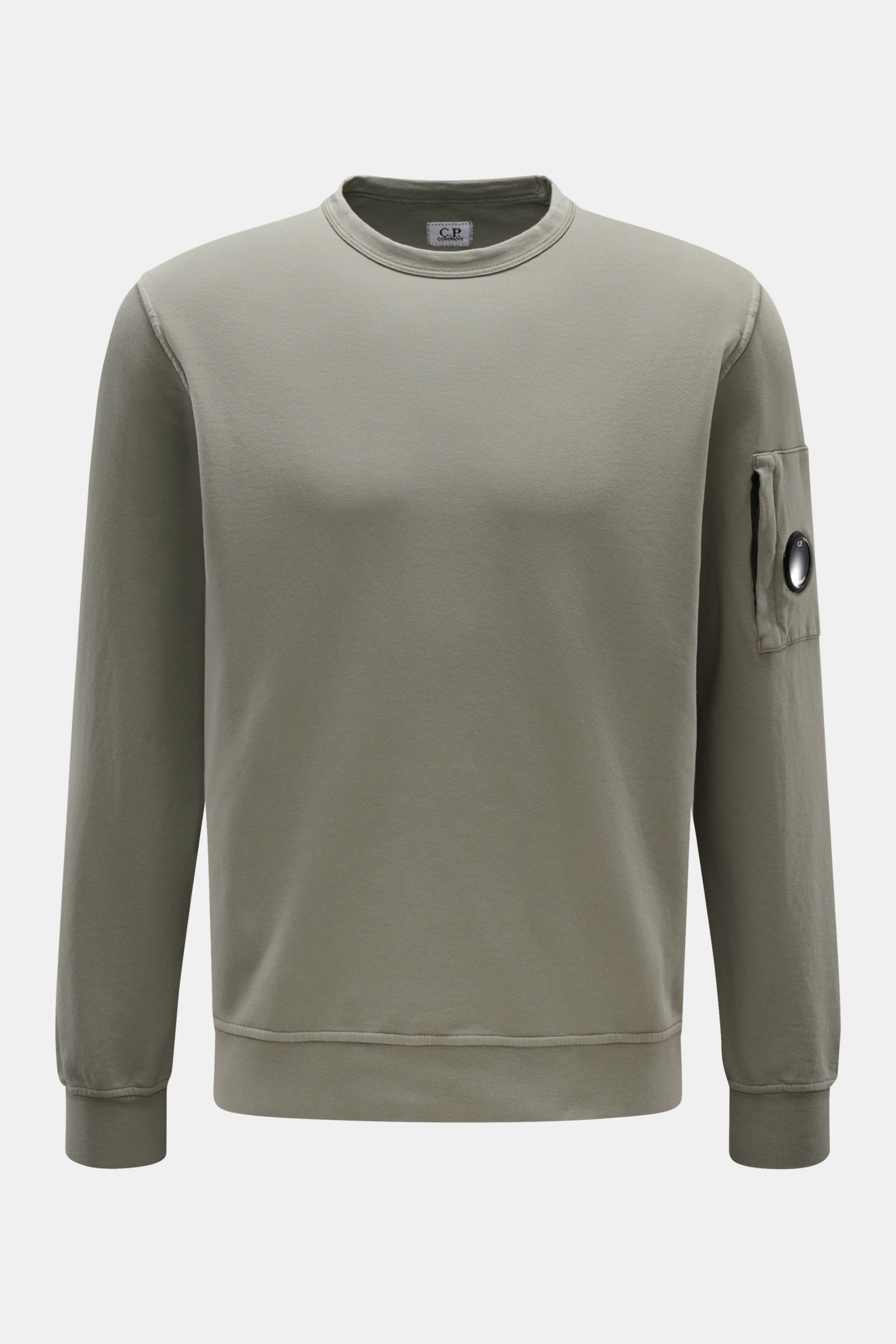 Front view of a C.P. Company Sweatshirt salbei in a slim fit, light garment-dyed pure cotton with a round neckline, ribbed cuffs, and a zipped sleeve pocket featuring the brand's signature lens detail. 