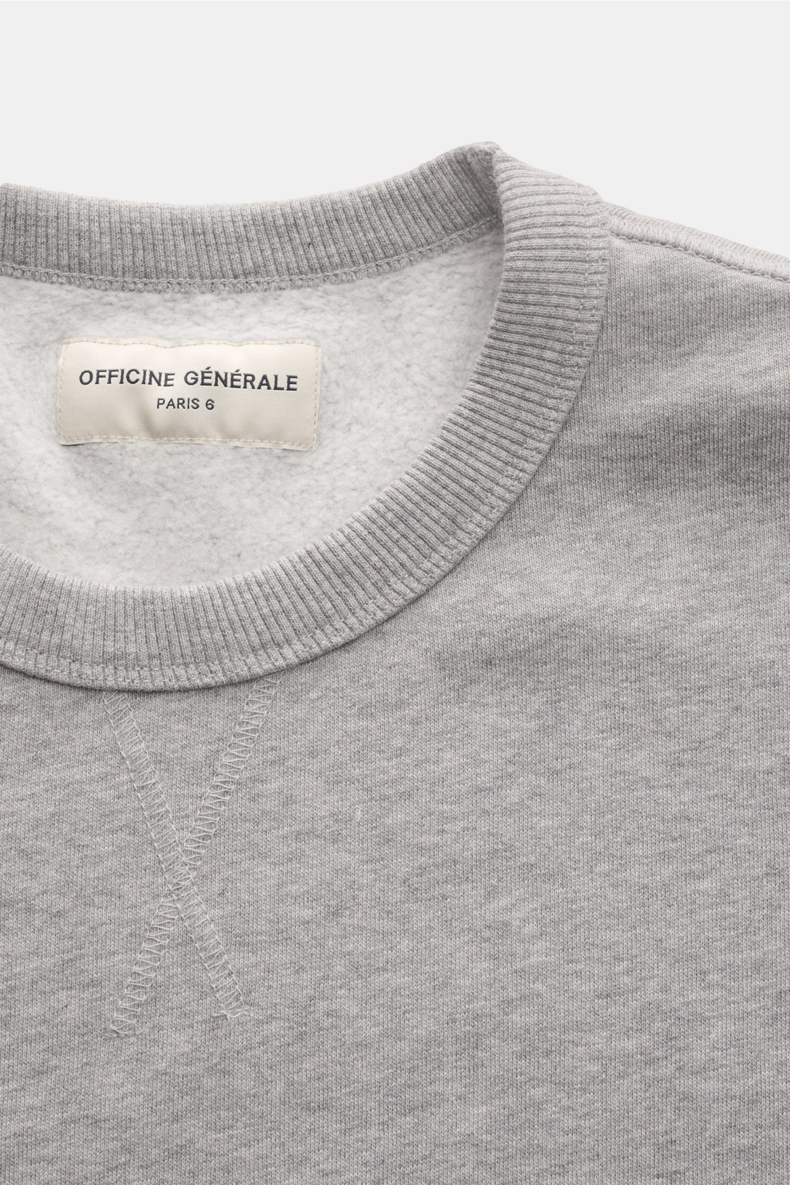Close-up front view of Officine Générale Sweatshirt 'Darius' grey mottled in pure cotton with soft brushed inside, crew neck, ribbed bands, and regular fit, showcasing comfort and casual style. 

Description: 
A luxurious basic: The sweatshirt 'Darius'