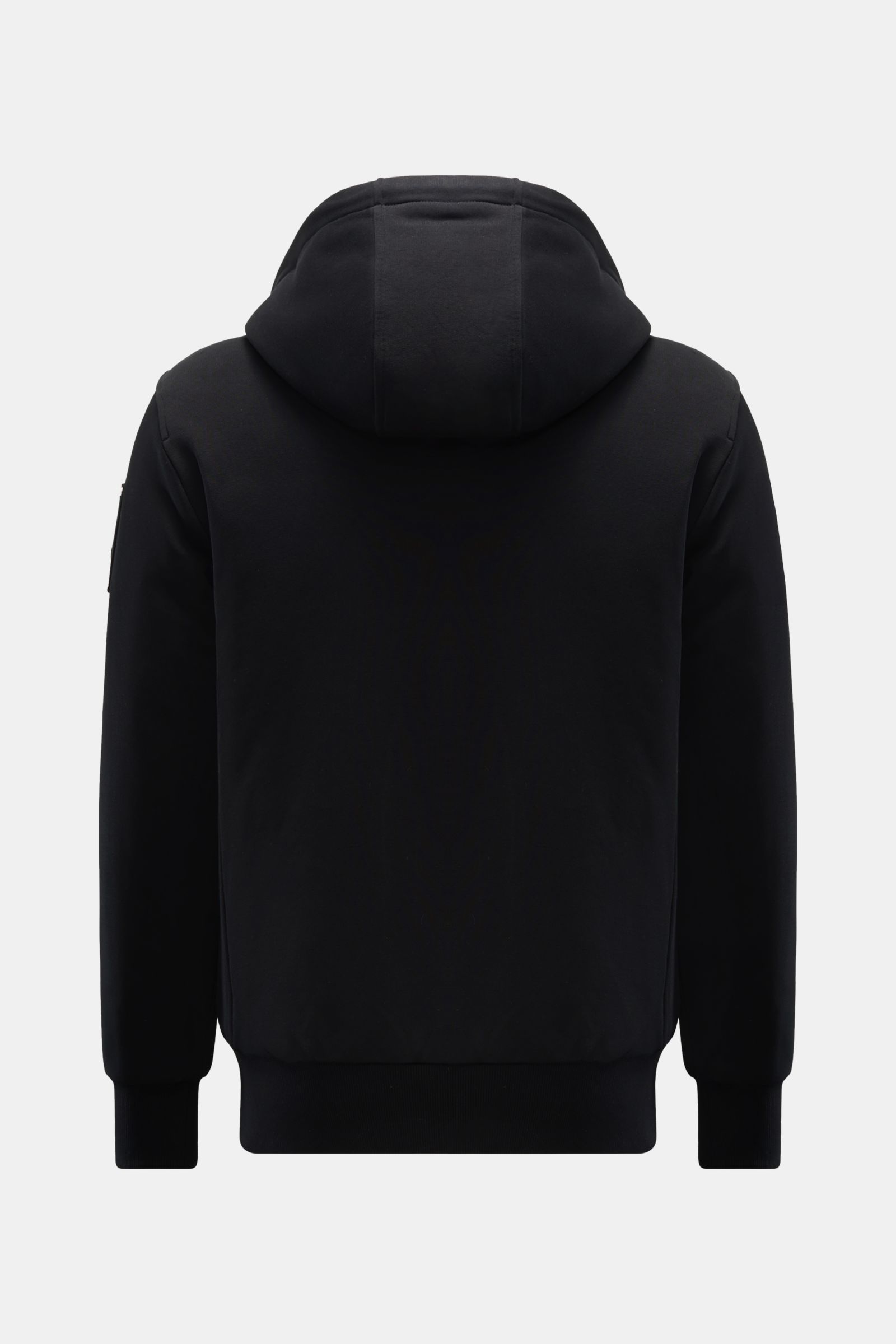 Rear view of the Moose Knuckles Sweatjacke 'Classic Bunny' schwarz, a slim fit black hoodie with a soft cotton and microfiber jersey, light padding, ribbed cuffs, and a hood with removable faux-fur lining.

Perfekt für kalte Tage: Dank der leichten Wat