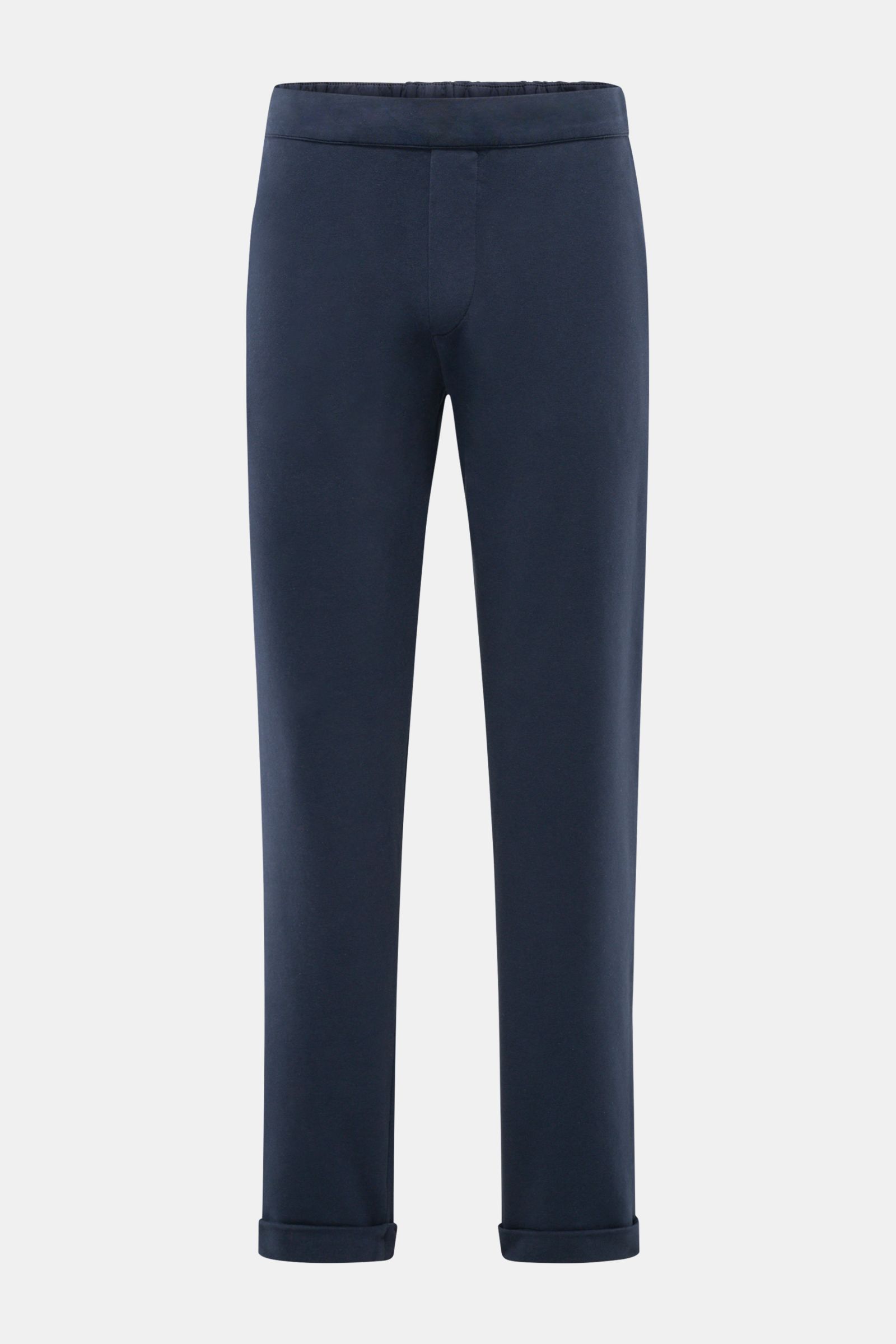 Front view of 04651/ A trip in a bag Jogger pants 'If' navy in soft cotton jersey with tapered fit, elasticated waistband, faux fly, French pockets, patch back pocket, and fixed hem turn-up, showcasing comfort and modern silhouette.

Comfort meets styl