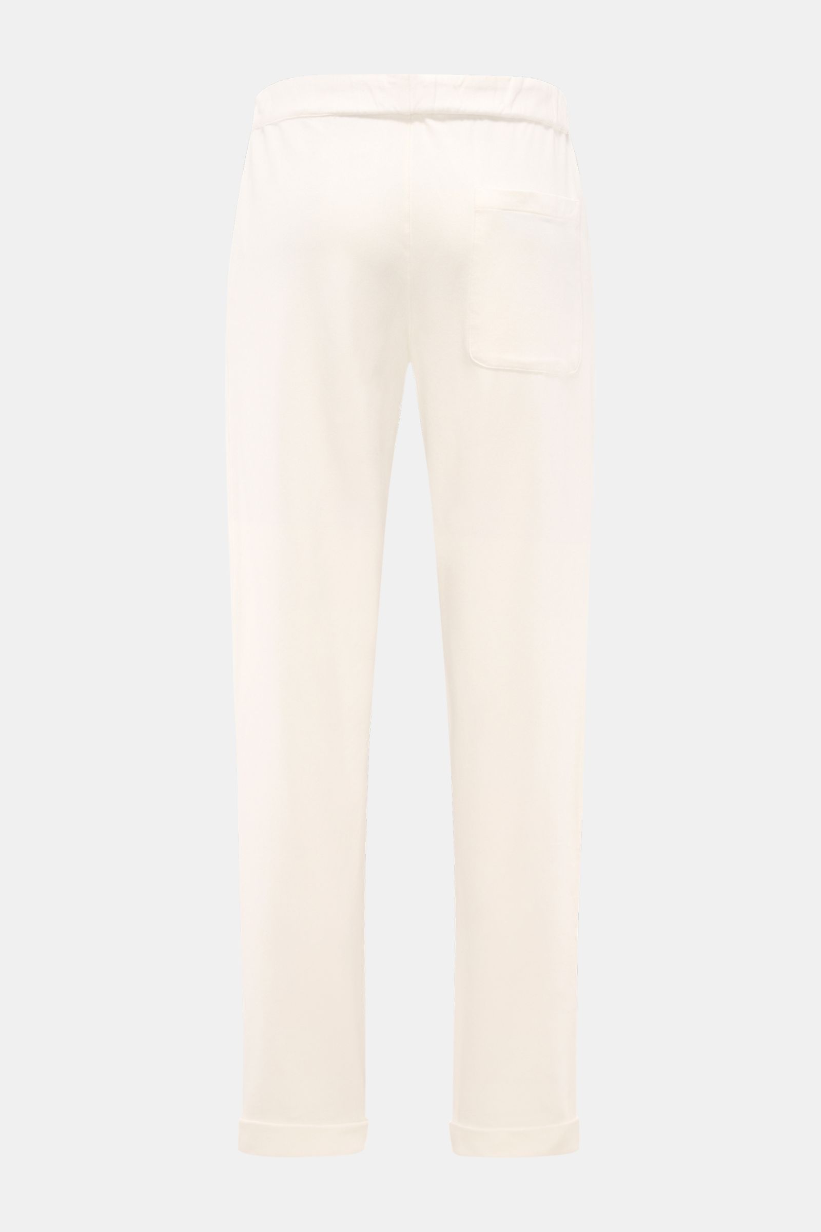 Rear view of 04651/ A trip in a bag Jogger pants 'If' off-white in soft cotton jersey featuring a tapered fit, elasticated waistband with drawstring, patch back pocket, and fixed hem turn-up.

Description: Comfort meets style: These jogger pants in sof
