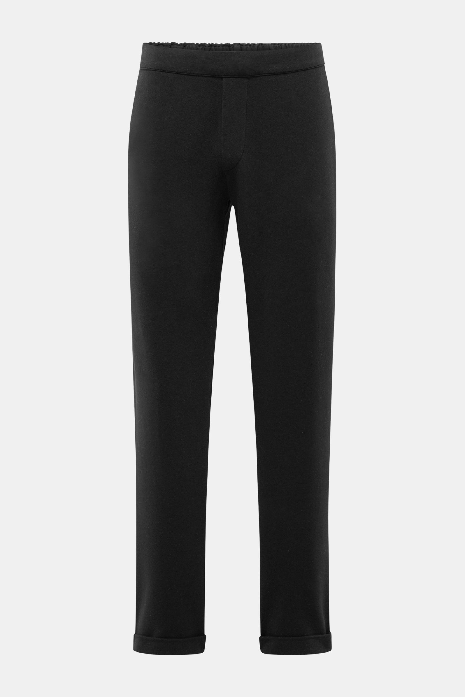 Front view of 04651/ A trip in a bag Jogger pants 'If' black in soft cotton jersey featuring tapered fit, ankle length, elasticated waistband with drawstring, faux fly, French pockets, patch back pocket, and fixed hem turn-up. Comfort meets style: These j