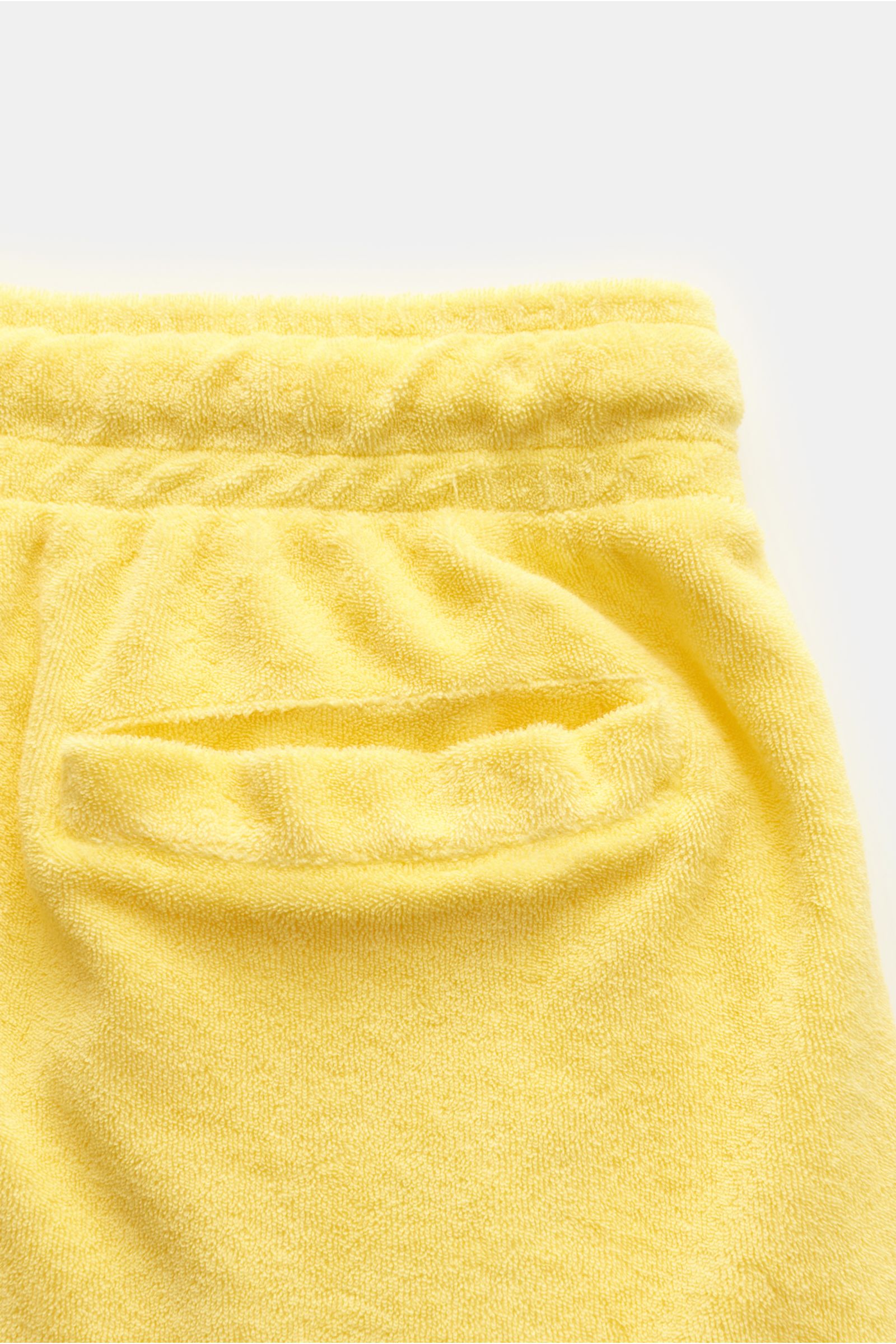 04651/ A trip in a bag Frottee-Bermudas 'Oyster' gelb