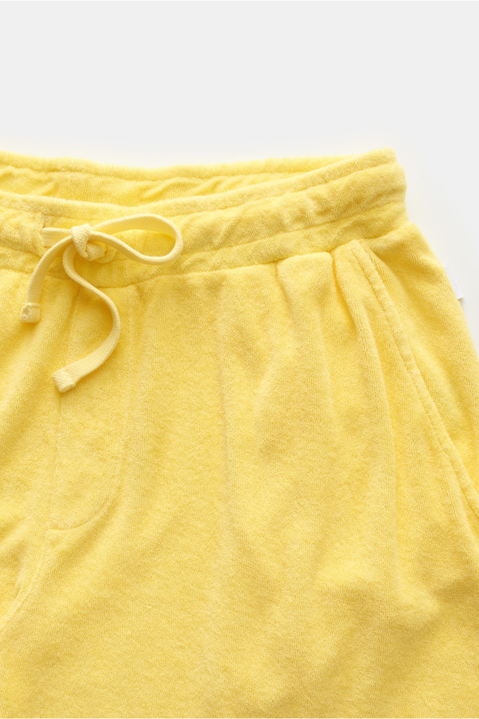 04651/ A trip in a bag Frottee-Bermudas 'Oyster' gelb