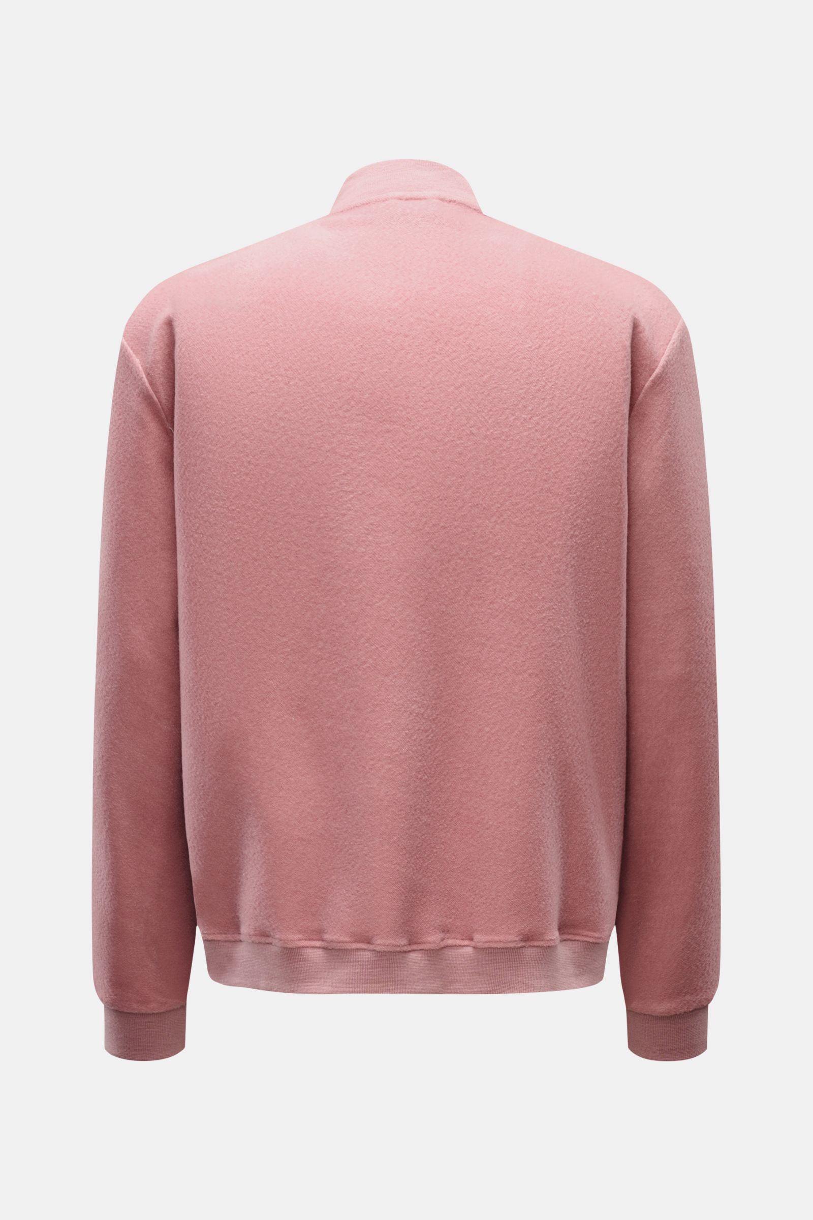 Back view of the 04651/ A trip in a bag Blouson altrosa in soft pink, showcasing its slim fit, wool-cotton fleece texture, rib knit collar, cuffs, and hem, photographed against a white background. Lässig durch die Übergangszeit: Der Blouson von 04651/ A T