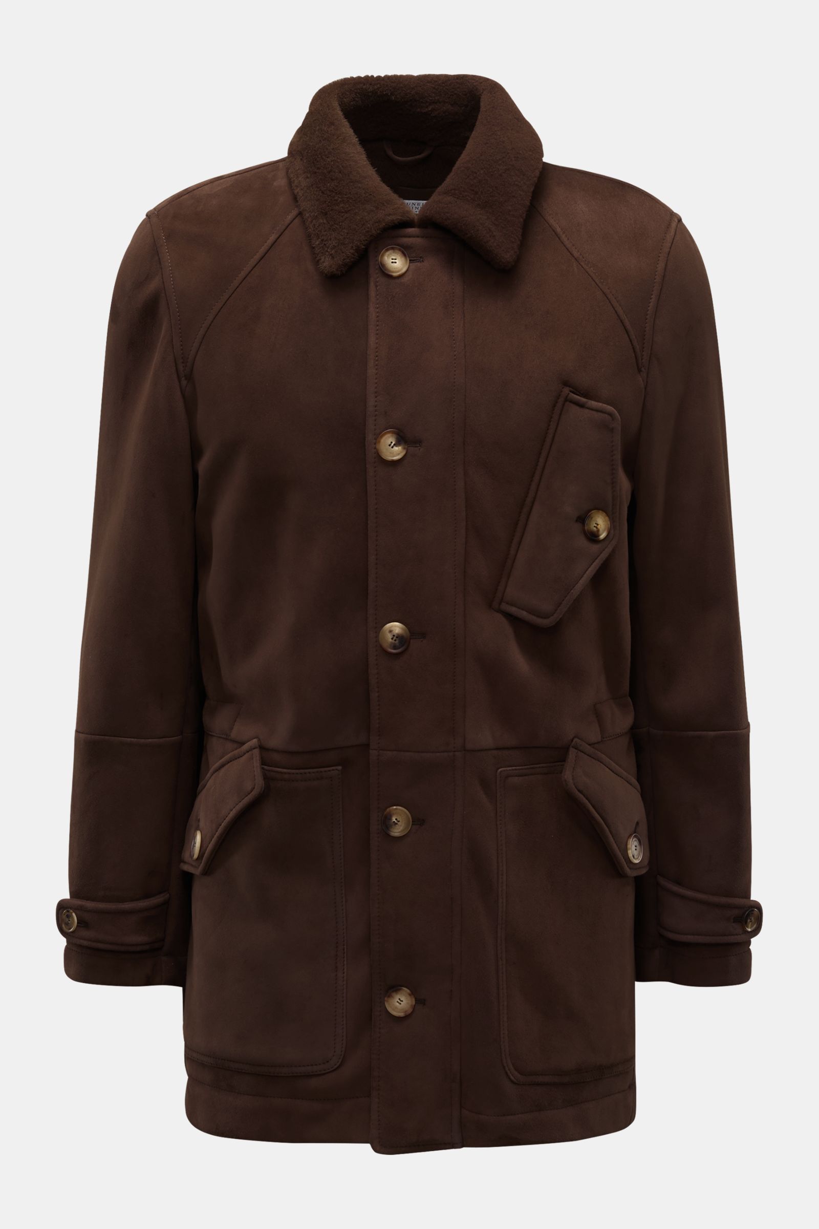 Front view of Brunello Cucinelli Lederjacke dunkelbraun, a slim fit dark brown leather jacket with soft collar, buttoned pockets, and smooth lining.

Description: Geschmeidiges Leder: Diese retroeske Jacke von BRUNELLO CUCCINELLI vereint hochwertigsten