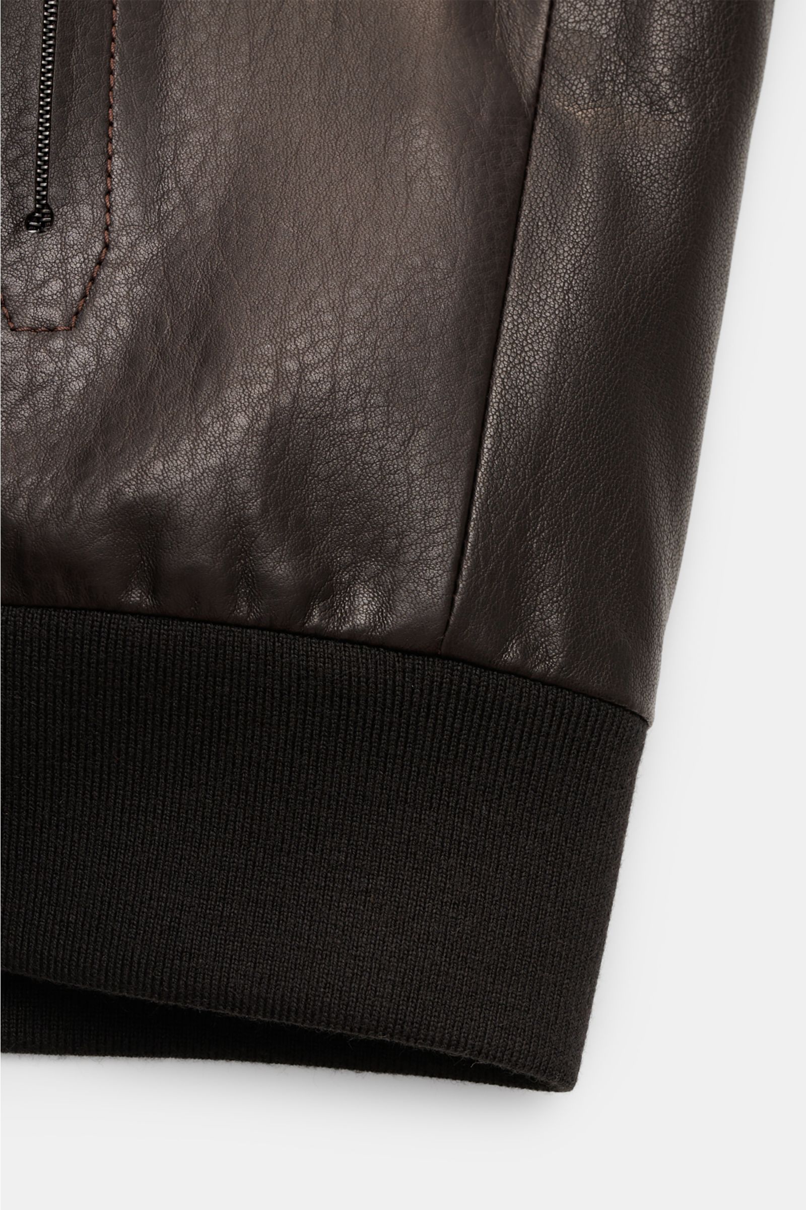 Close-up of the elastic hem and lower sleeve cuff of the Brioni Leather blouson 'Plad' dark brown, showing elegant lambskin leather texture.