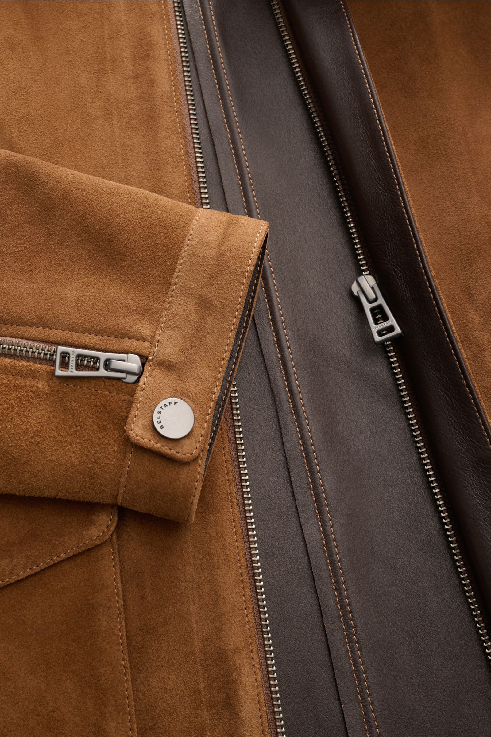 Close-up front view of Belstaff Suede jacket 'Outland' brown, showcasing supple suede, robust zip, snap buttons, and soft, slim fit design.
