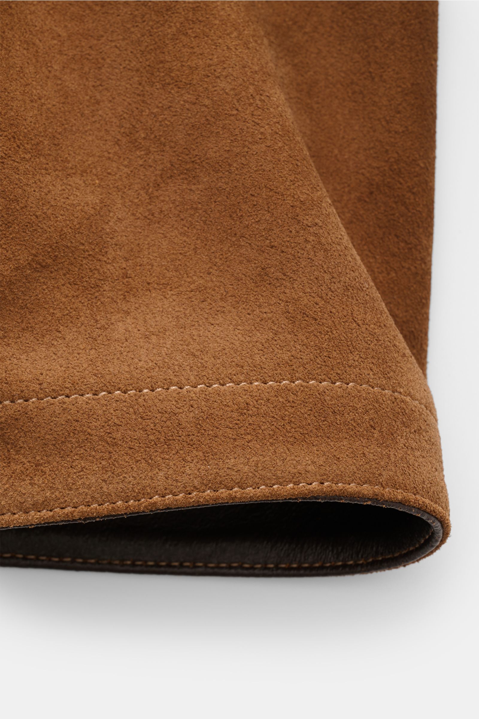 Close-up front-side view of the sleeve cuff of the Belstaff Suede jacket 'Outland' brown, showing supple suede, soft feel, and slim fit with detailed stitching. An urban classic for spring: The suede jacket 'Outland' by BELSTAFF is a stylish, eye-catching
