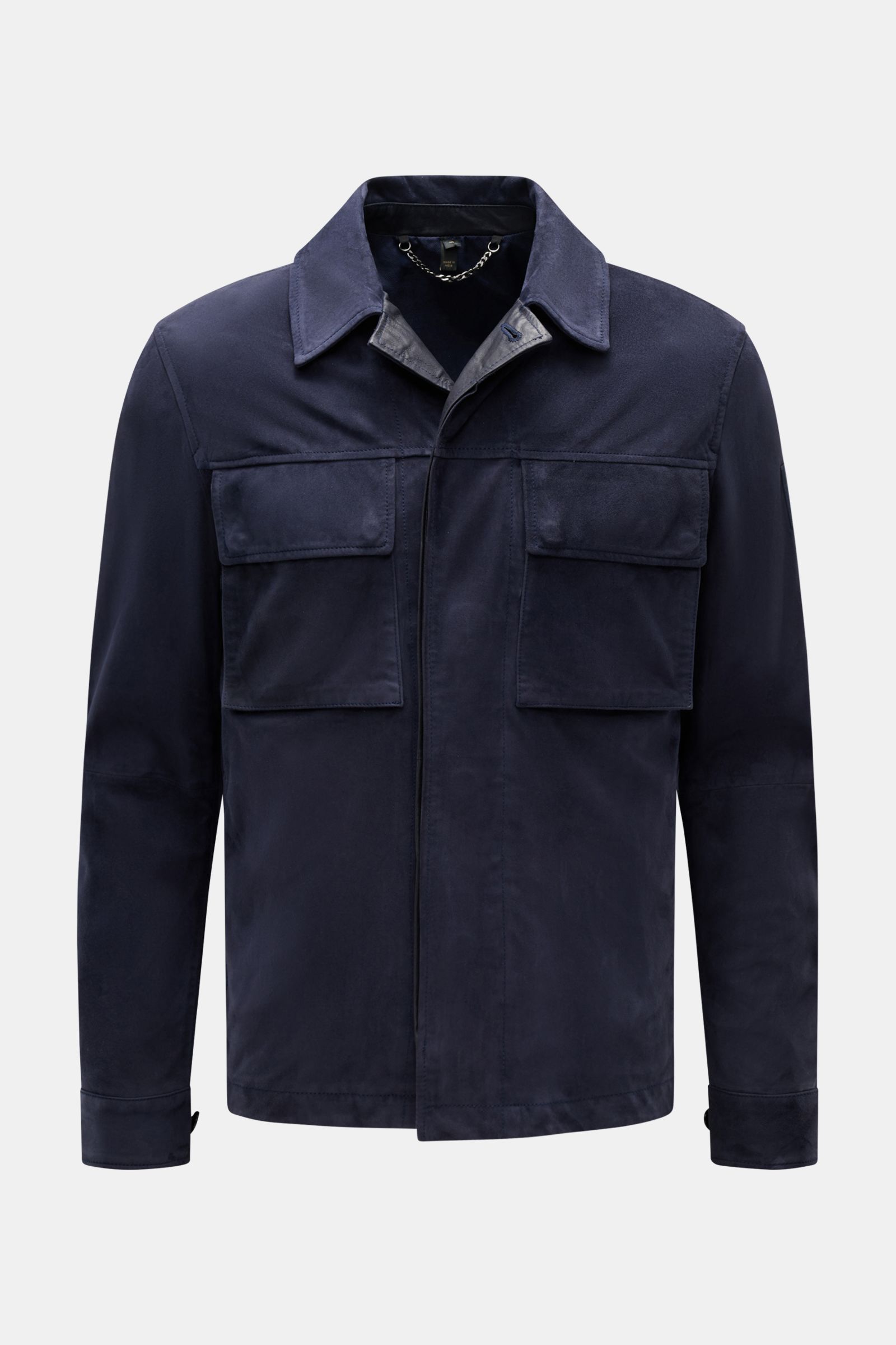 Front view of Belstaff Suede jacket 'Waymark' navy in supple suede with concealed button placket, patch breast pockets, turn-down collar, and cuffs.

Description: 
A versatile piece in supple suede: The hybrid 'Waymark' by BELSTAFF is a cool alternativ