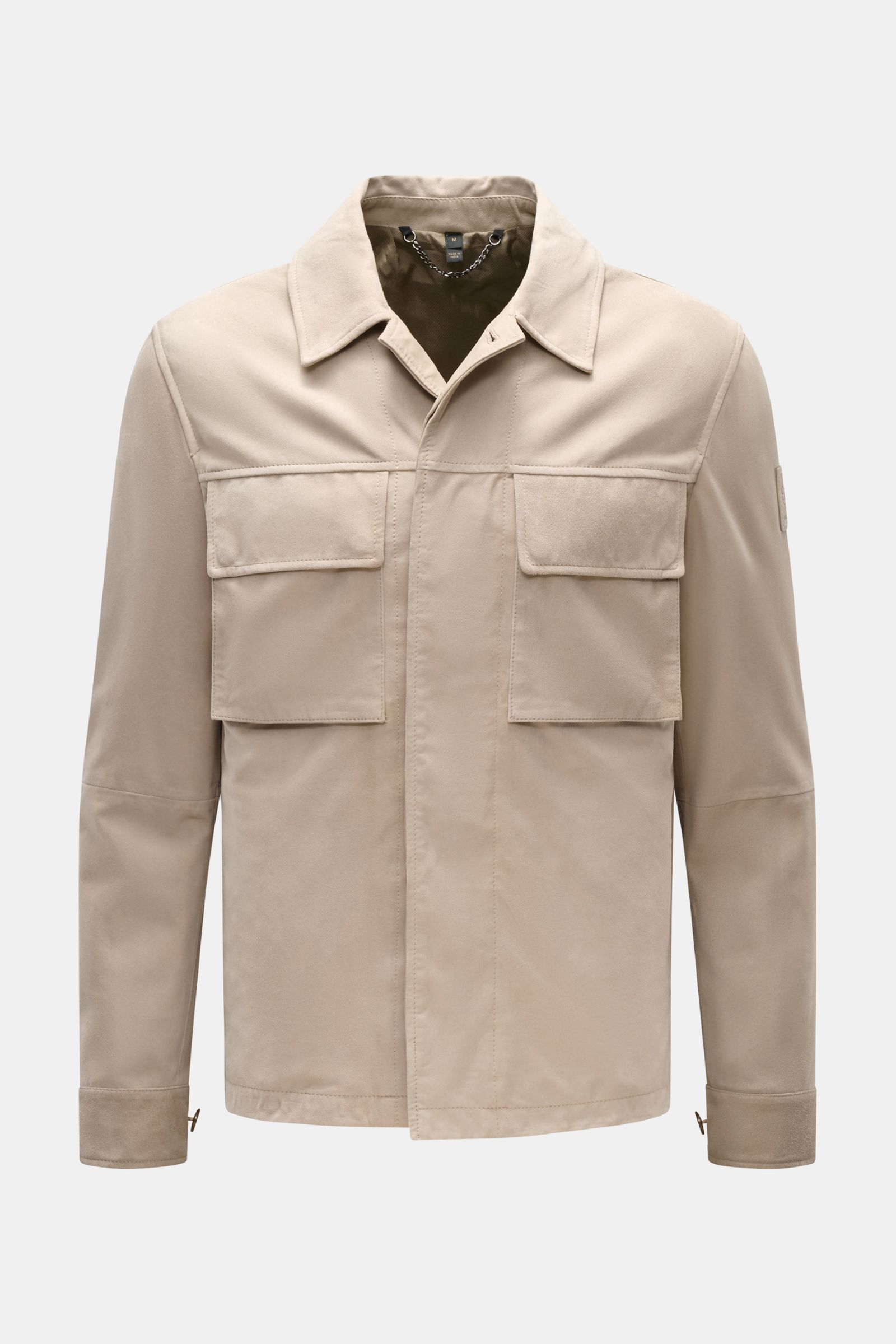 Front view of Belstaff Suede jacket 'Waymark' sand in supple suede with concealed button placket, patch breast pockets, and turn-down collar.

Description: 
A versatile piece in supple suede: The hybrid 'Waymark' by BELSTAFF is a cool alternative piece