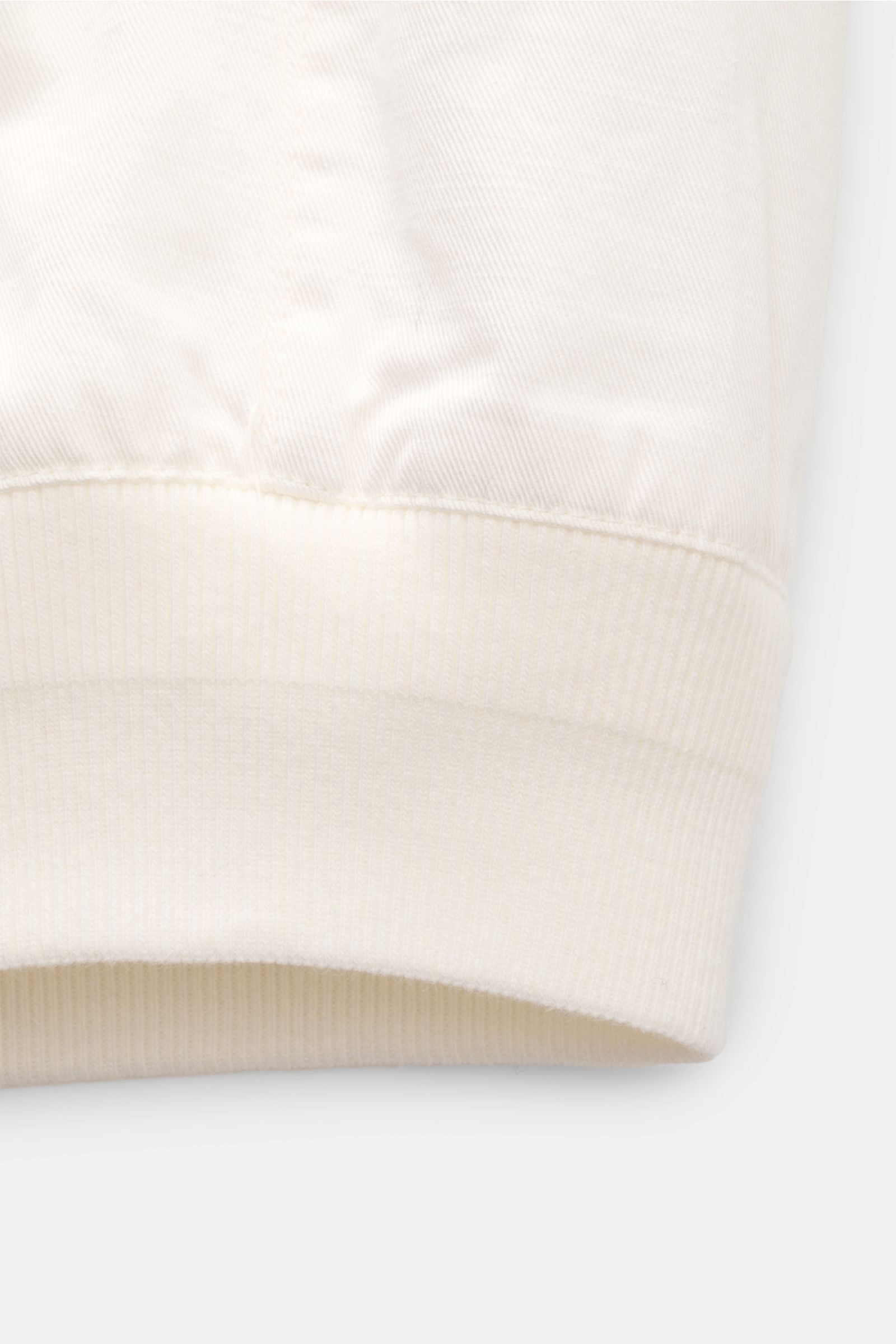 Polo Ralph Lauren Blouson weiß, leichter Baumwolltwill, Slim Fit, robuster Reißverschluss, Stehkragen, Hüfttaschen, Rippbündchen, Detailansicht Bündchen.