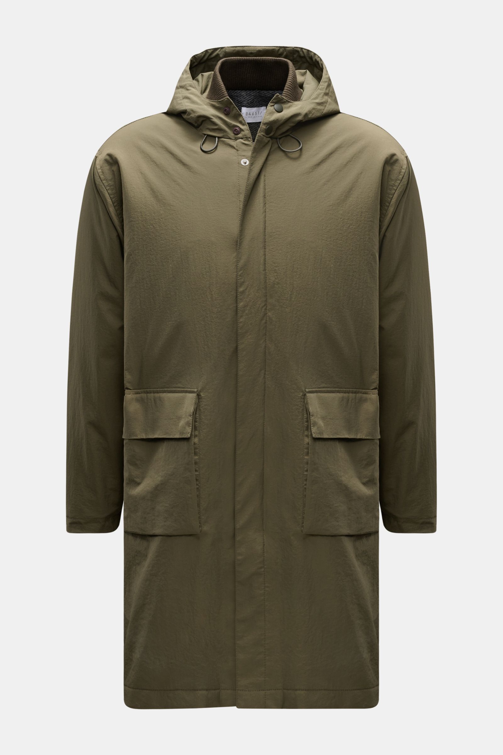 Front view of the 04651/ A trip in a bag Parka 'The Triple' oliv, a sporty and versatile olive-green parka with removable vest, hood, large front pockets, zipper, and wind flap with buttons, made from high-quality microfiber with a lightly textured feel, 