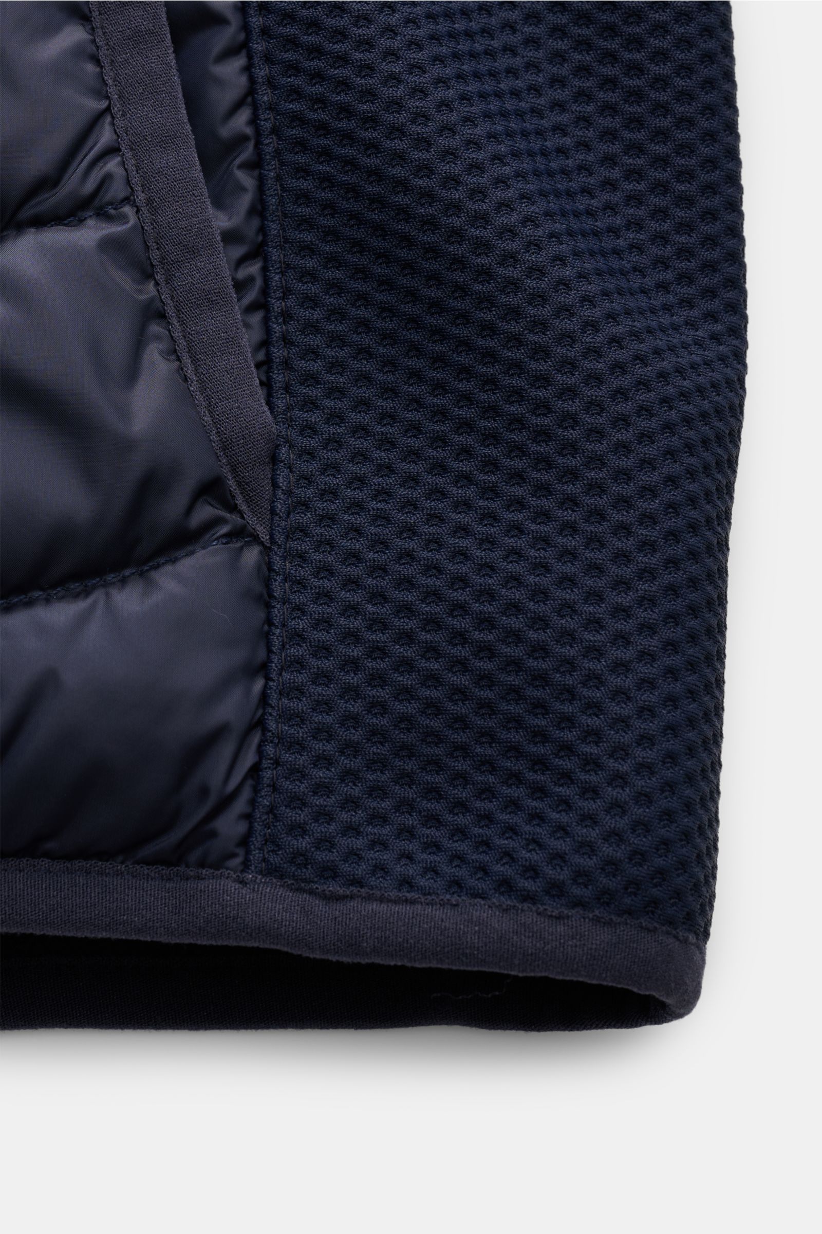 Close-up view of the Parajumpers Daunenjacke 'Jayden' navy sleeve showing high-quality microfiber with a smooth touch, wind-resistant, slim fit design, lightweight down filling in chest and back, mesh sleeves, stand-up collar with button strap, Parajumper