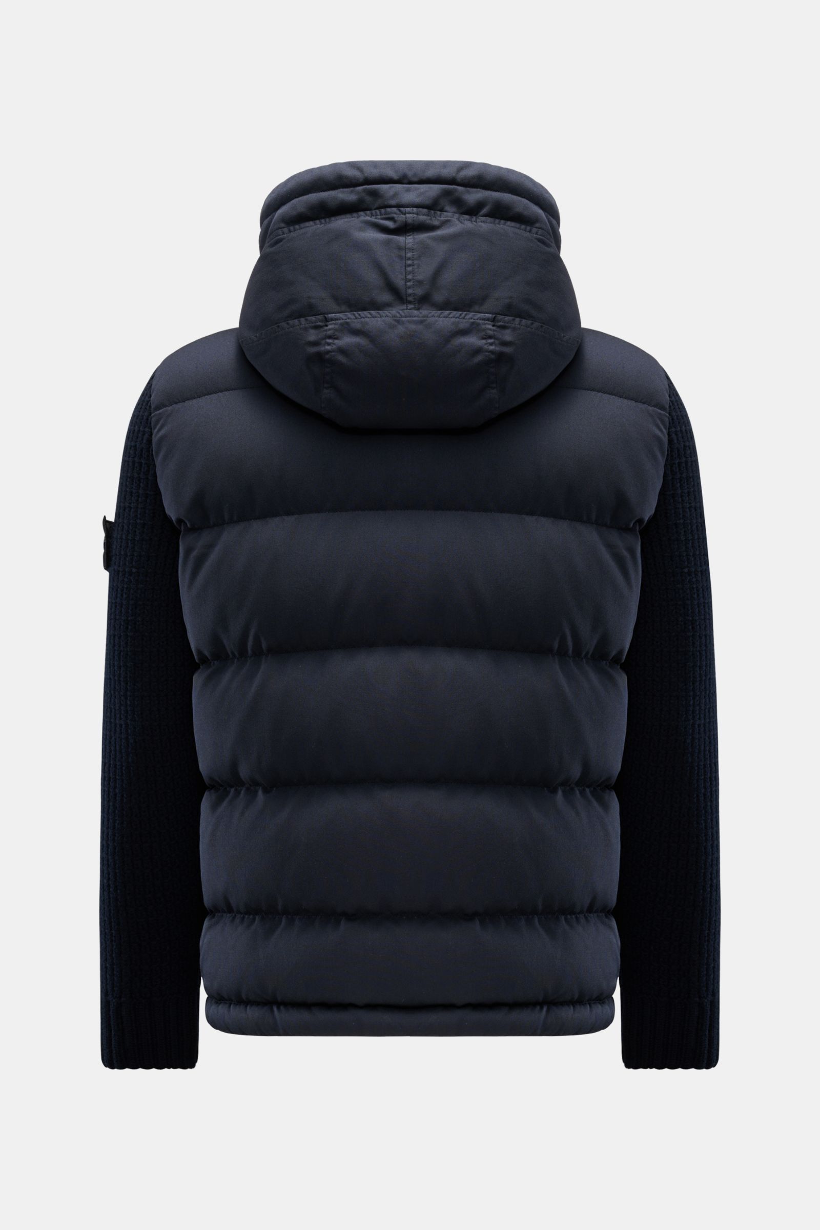 Stone Island Daunenjacke 'Twill Wool-TC Ghost Piece' navy shown from the back, featuring a padded down-filled body with a hood, knit sleeves, and ribbed cuffs. Monochromes Statement-Piece für die Übergangszeit: Die Daunenjacke aus der 'Ghost' Kollektion v