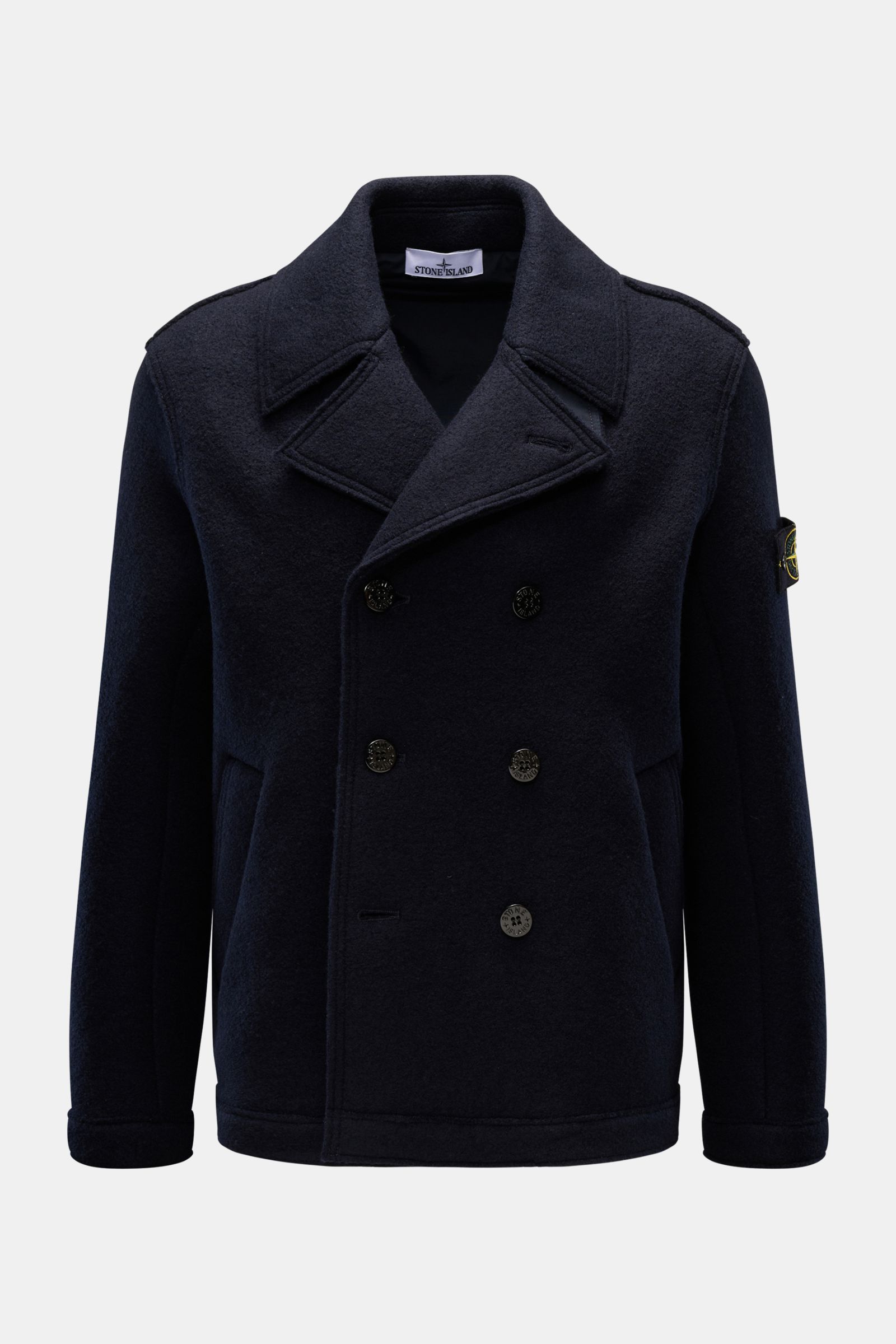 Stone Island Cabanjacke navy aus reiner, gefilzter Wolle, weicher Griff, garment dyed, zweireihige Drei-Knopf-Leiste, variabler Kragen mit Knopfriegel, schräge Leistentaschen, typisches Kompass-Badge am Ärmel, frontal fotografiert.
