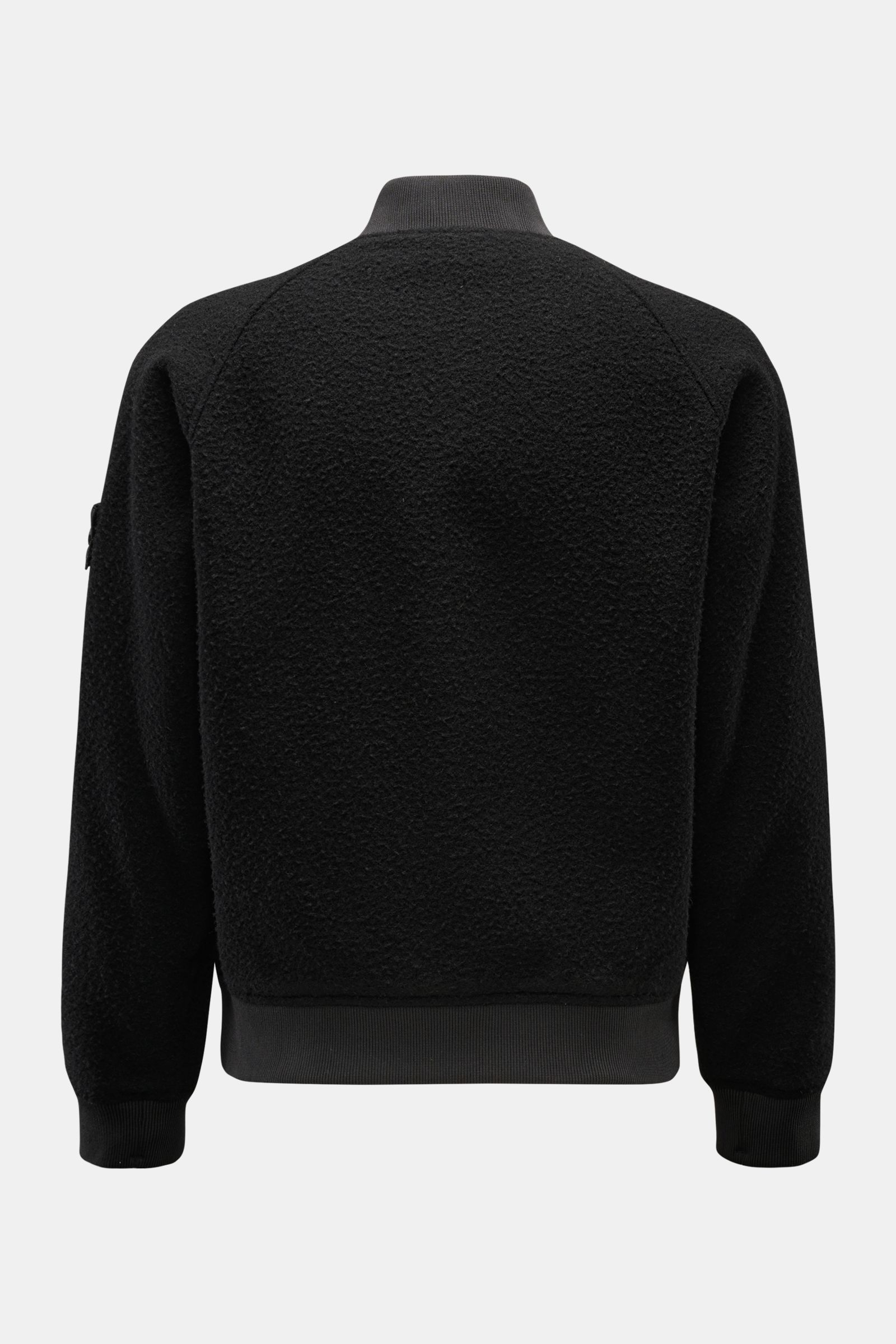 Rear view of Stone Island Blouson 'Panno Ratinato' schwarz in black wool-mix with raglan sleeves, ribbed collar, cuffs, and hem.