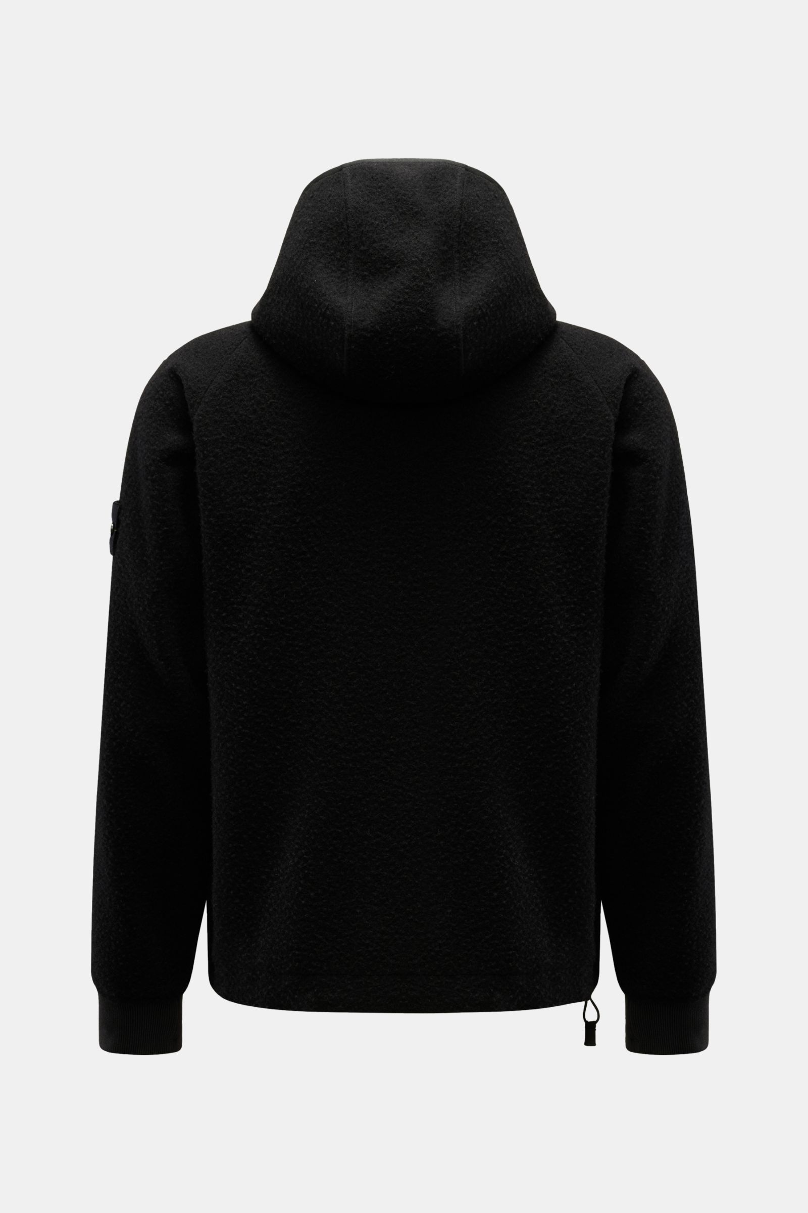 Back view of Stone Island Jacket 'Panno Ratinato' black with hood, ratiné wool-microfibre blend, ribbed cuffs, and adjustable hem.

Functional and eye-catching: This STONE ISLAND hooded jacket is an eye-catching, sporty piece for the colder months, tha