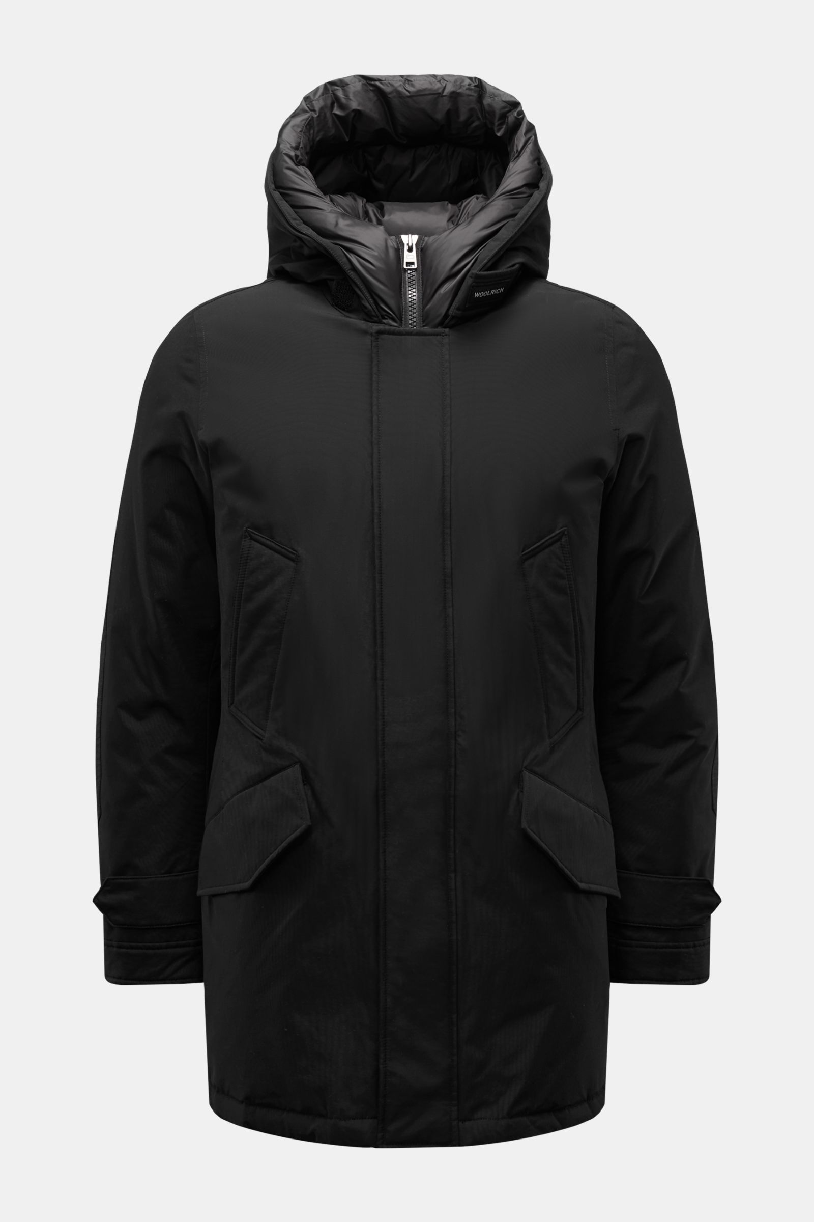 Front view of the Woolrich Daunenparka 'Polar High Collar' schwarz, a black slim-fit parka with a padded hood, four front pockets, and durable two-way zipper. Performance meets style with wind- and water-resistant cotton-microfiber blend fabric and natura