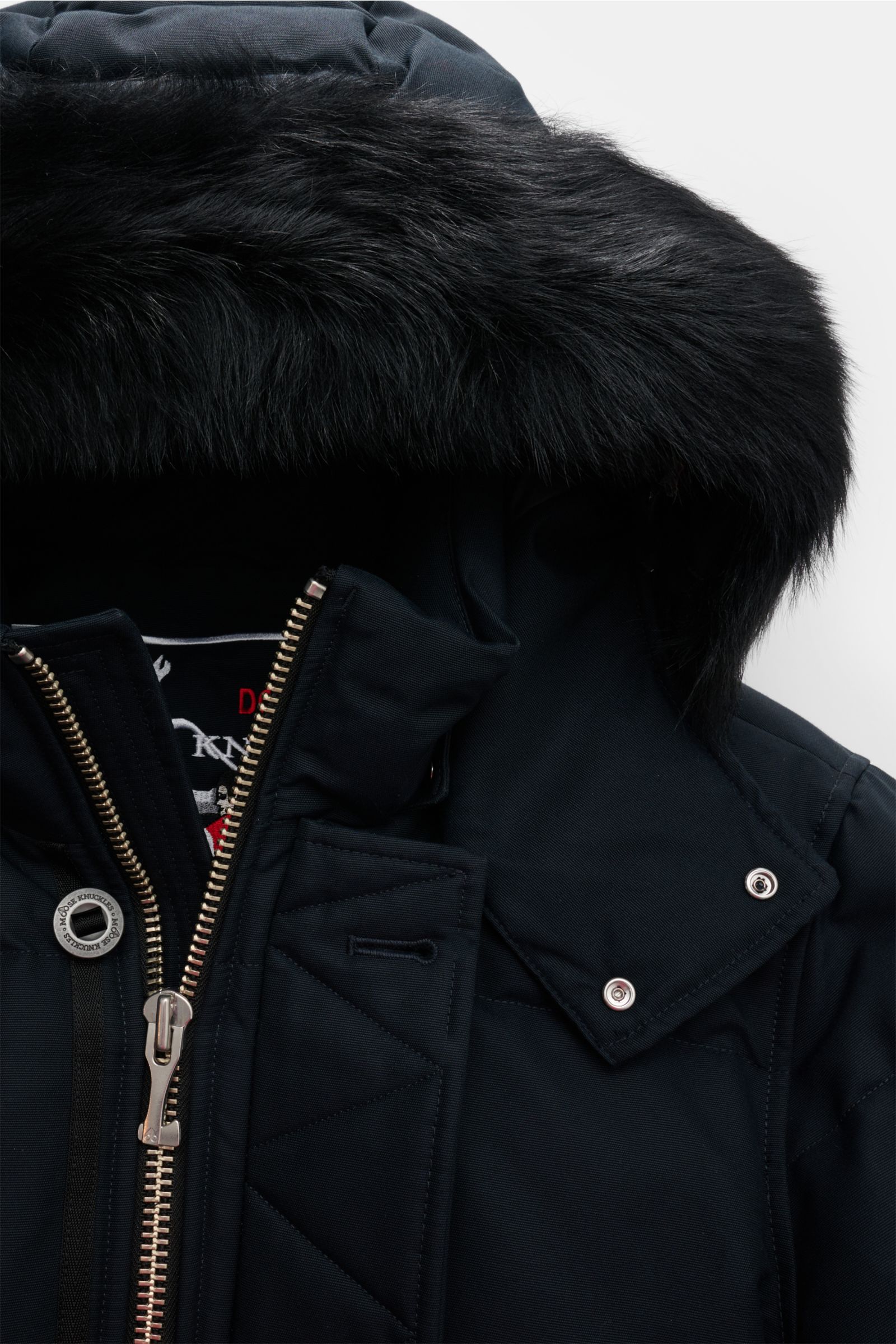 Close-up front view of the navy Moose Knuckles Down jacket 'Original 3q Neoshear' with detachable black fur-trimmed hood, zip, and storm flap.

Description: Effortlessly protects against even extreme cold: With its high-quality 90/10 down lining, this 