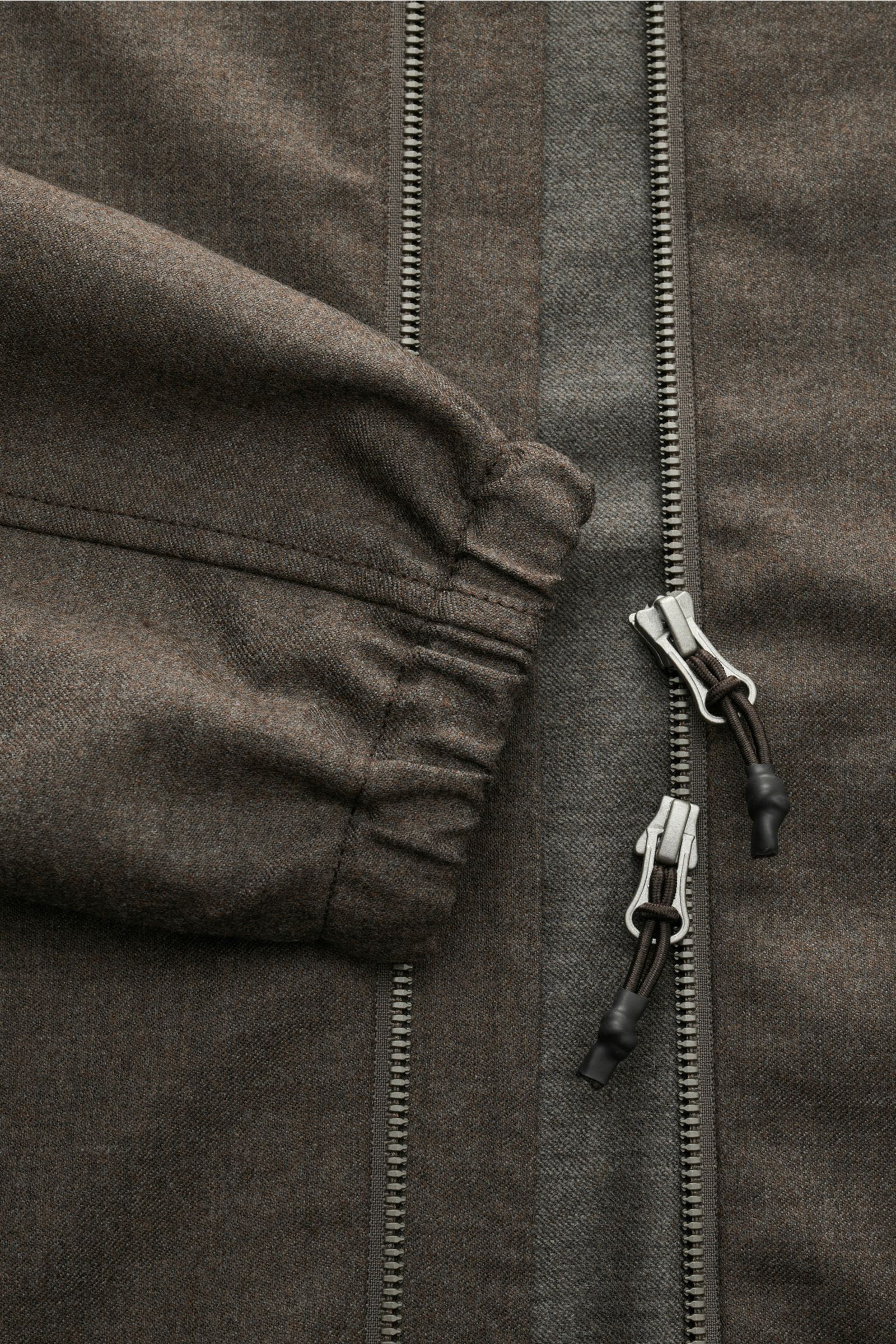 Close-up front view of The Product is the Hero Blouson 'Billy' grey-brown mottled, showing soft wool fabric, two-way zipper, and elastic sleeve cuff. An all-rounder for the transitional period: this blouson blends virgin wool and microfiber with a soft fe