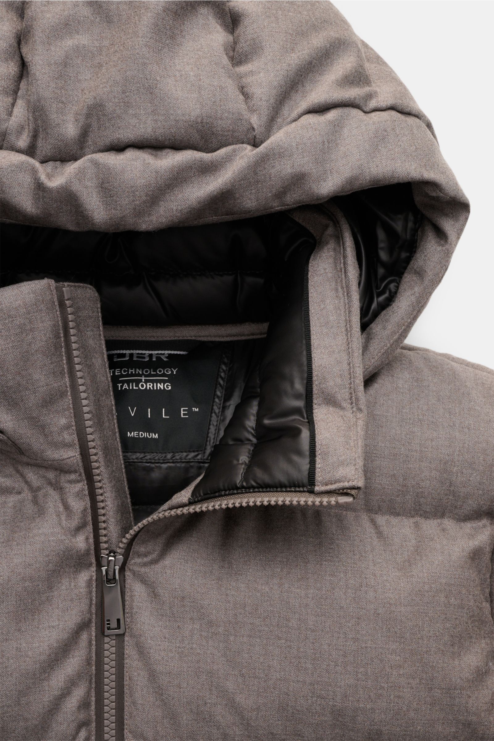 Close-up front view of UBR Daunenjacke 'Concord' grau meliert showing the soft wool fabric, two-way zipper, and padded hood interior. Urban style meets high-performance: The down jacket 'Concord' by UBR combines innovative functionality with modern design