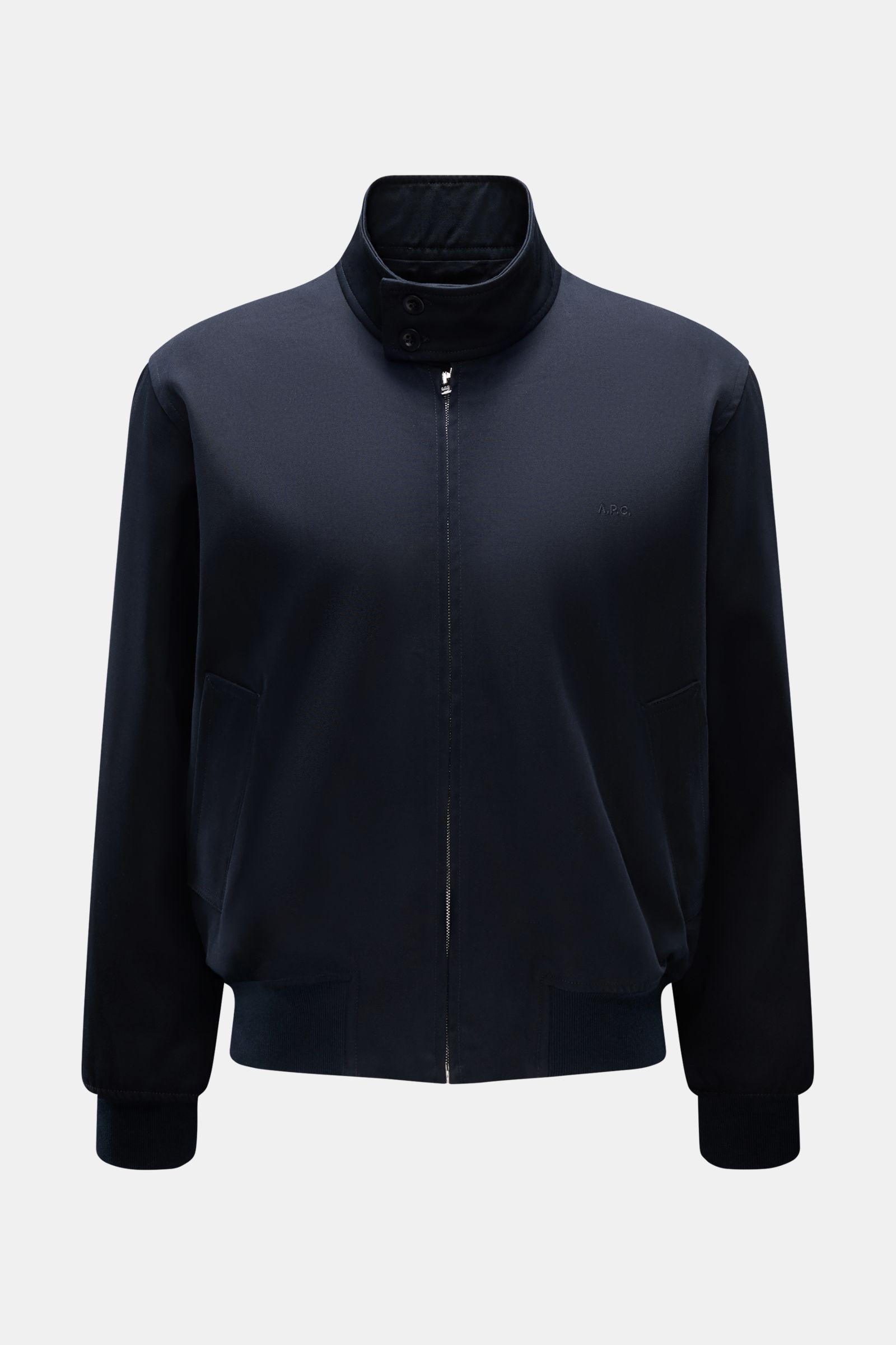 Front view of A.P.C. Blouson dark navy made of pure cotton gabardine with buttoned standing collar, concealed zip, tonal logo stitching, elastic hem and cuffs, slanted hip pockets, and one inside pocket. Distinctive, urban and clean: This blouson by A.P.C