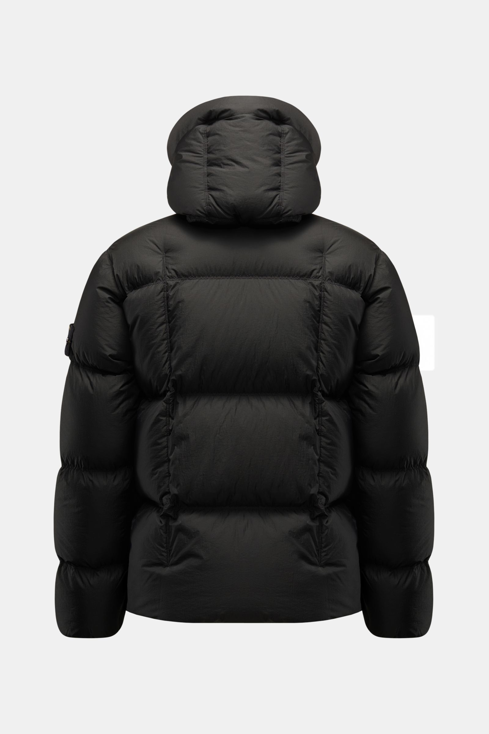 Back view of Stone Island Daunenjacke 'Seam Faded Light Nylon Tela' schwarz puffer jacket with padded hood, elastic cuffs, and down filling.

Additional description for context: 
Stilsicher auch an kalten Tagen: Die Daunenjacke von STONE ISLAND überzeu