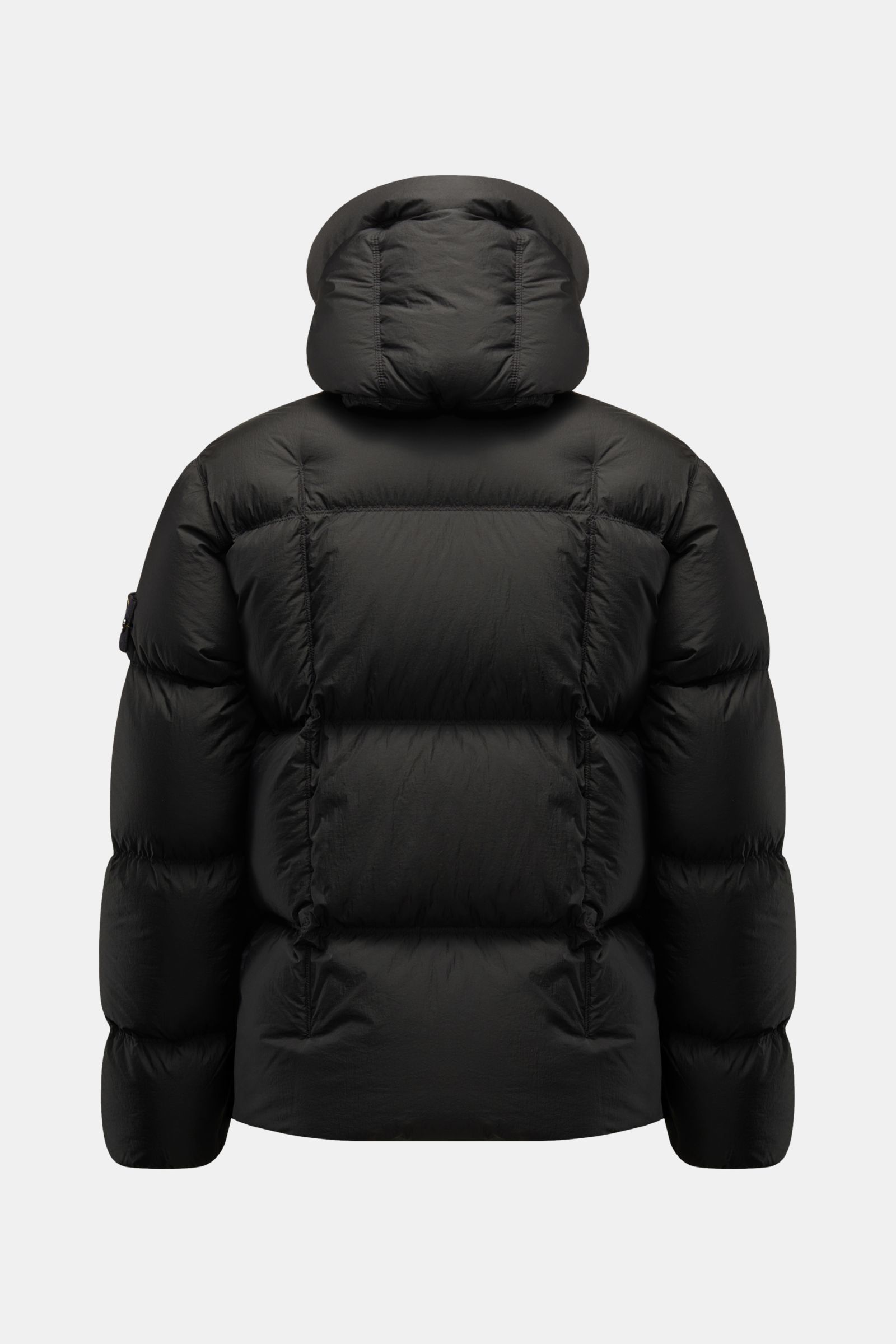 Rear view of Stone Island Down jacket 'Seam Faded Light Nylon Tela' black with padded hood, warm down lining, slim fit, and elasticated cuffs.
