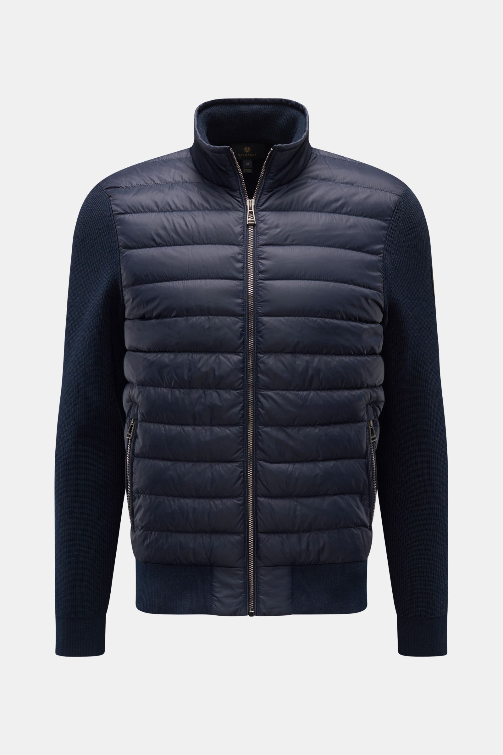 Front view of the Belstaff Daunenjacke 'Control Cardigan' navy, a hybrid biker jacket with microfiber front, wool knit sleeves, quilted down-filled front, extra slim fit, two-way zipper, high stand collar, Belstaff web label on upper arm, and comfortable 