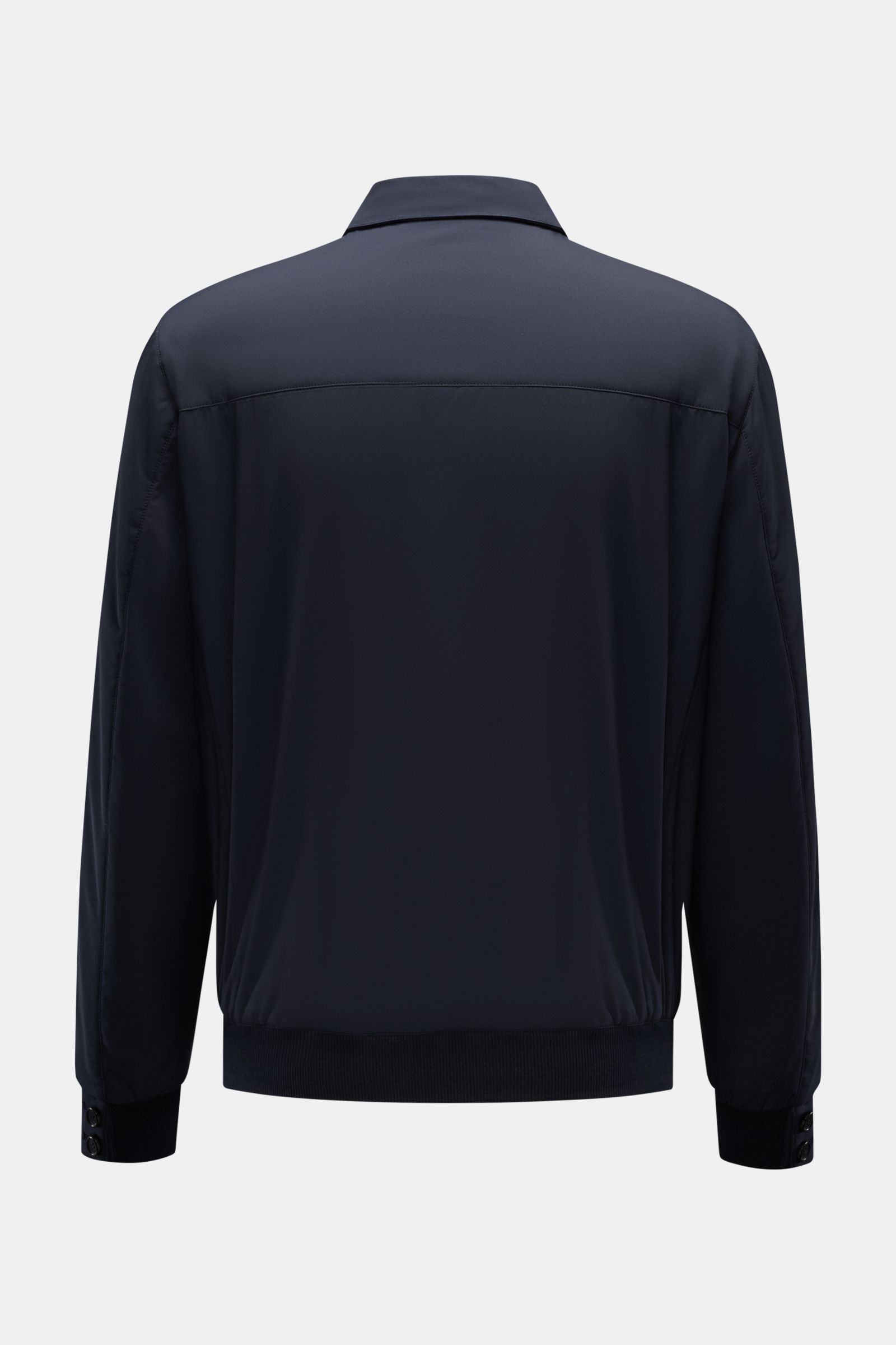 Back view of the Mandelli Blouson navy, a slim-fit, lightly padded jacket with microfiber fabric, smooth touch, ribbed cuffs, buttoned sleeve ends, and cotton-jersey lining for comfort. Der wattierte Blouson von MANDELLI interpretiert einen Klassiker m