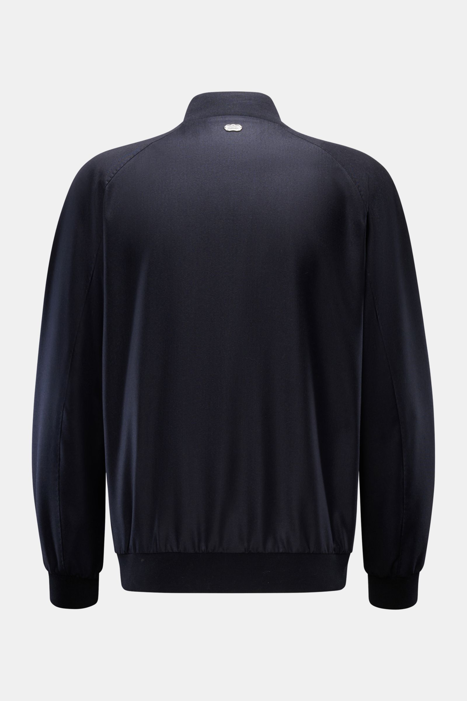 Back view of Agnona Blouson navy, a slim fit cashmere and silk jacket with rib knit collar, ribbed bands, and metal logo on the back.