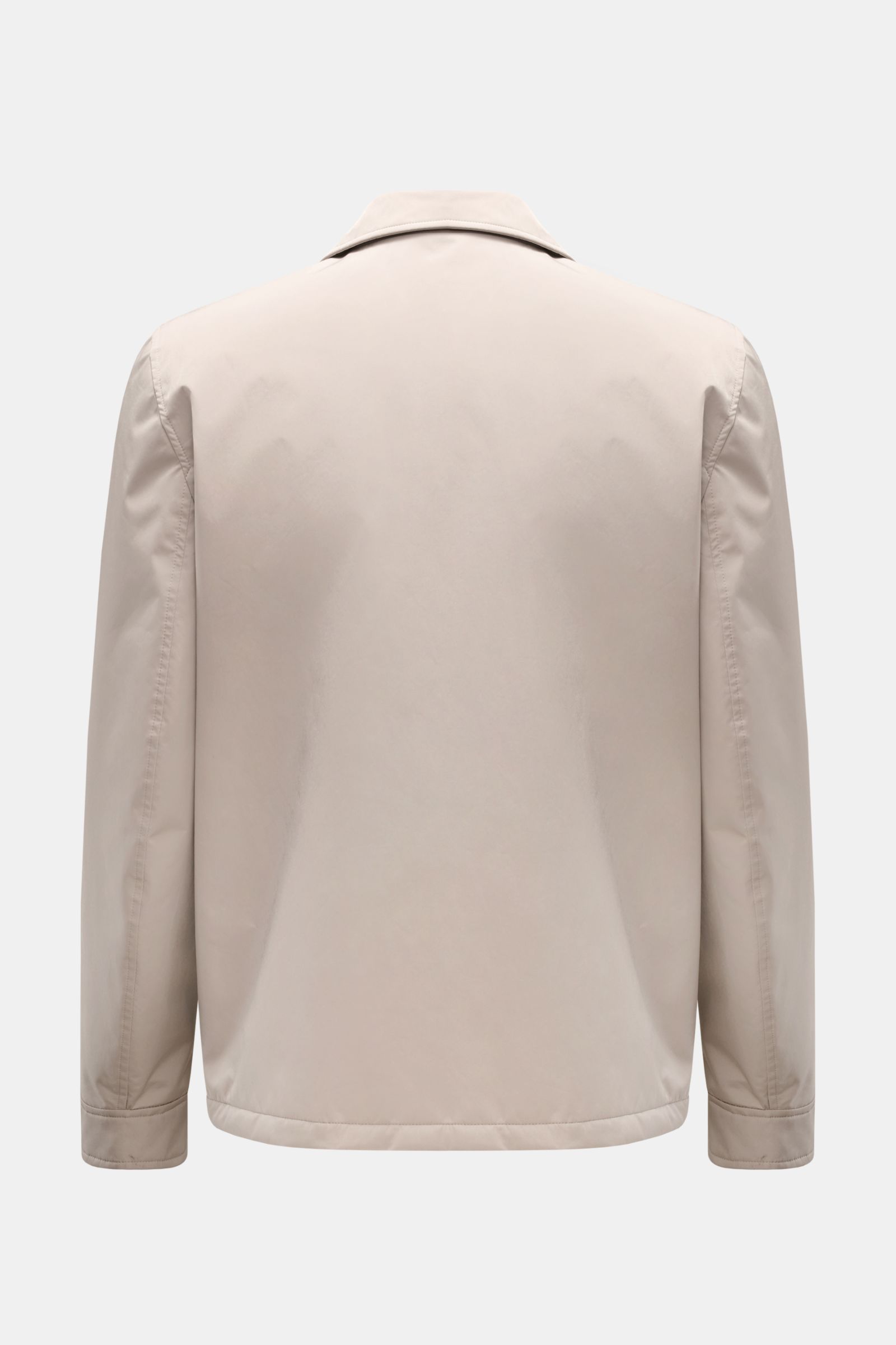 Back view of the Brunello Cucinelli Jacke sand, a regular fit jacket in high-quality sand-colored microfiber with a smooth, soft texture. The jacket features a classic collar, long sleeves with buttoned cuffs, and a lightweight, wind- and water-repellent 