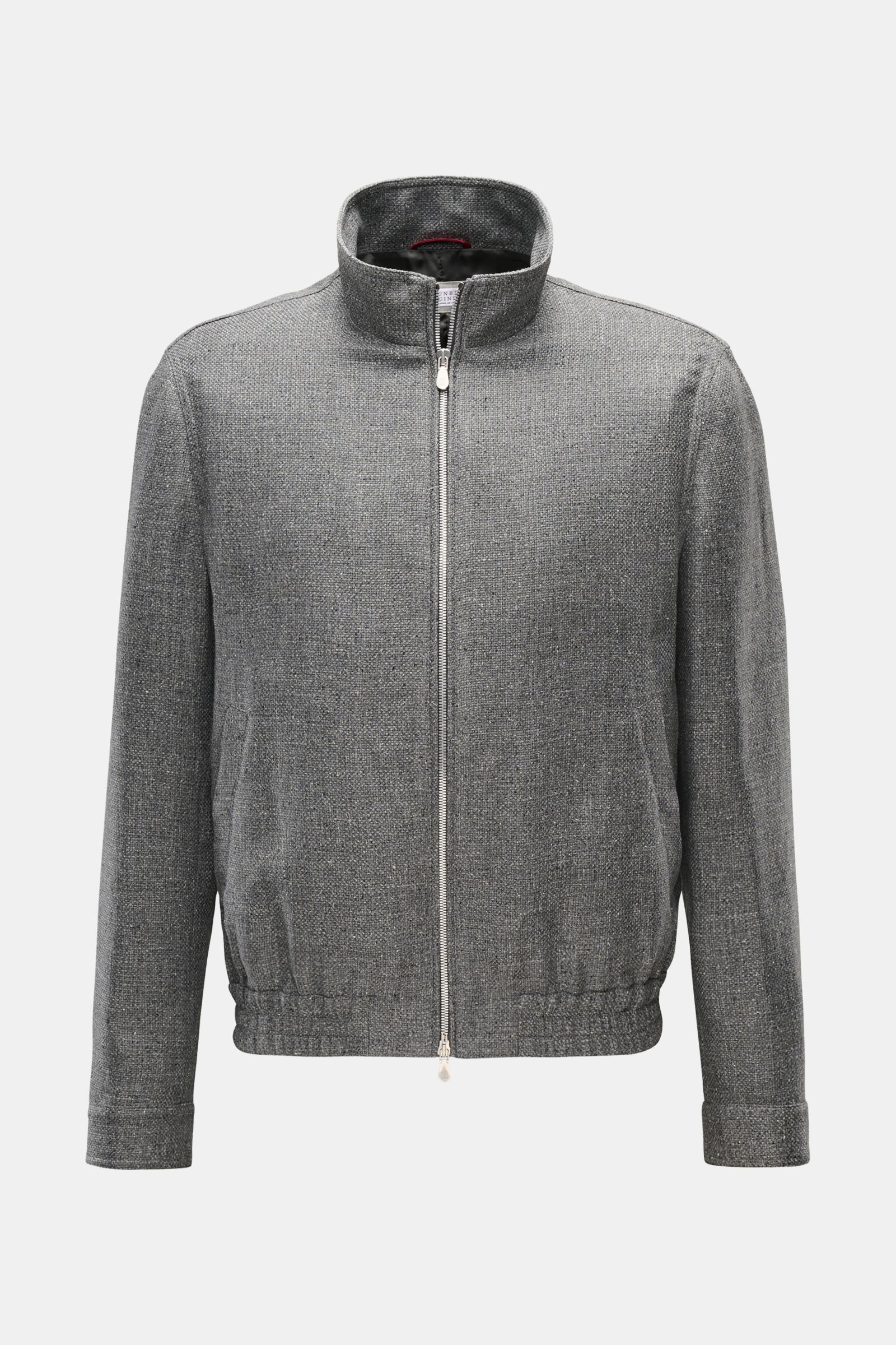 Front view of the Brunello Cucinelli Blouson sand meliert, a lightweight jacket in a wool, cashmere, and silk blend with a smooth feel, denim look, slim fit, two-way zipper, stand-up collar, slanted flap pockets with snap buttons, snap-button sleeve cuffs