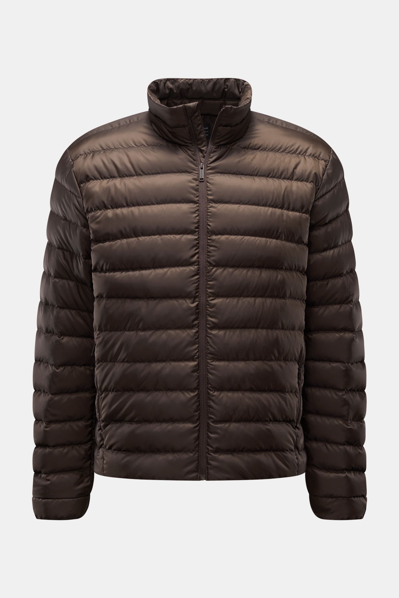 Front view of the Canada Goose Down jacket 'Stratus Tonal' dark brown, a super lightweight, slim fit puffer with padded collar and two zip pockets.

The super lightweight 'Stratus Tonal' down jacket by CANADA GOOSE with high-quality ripstop outer mater