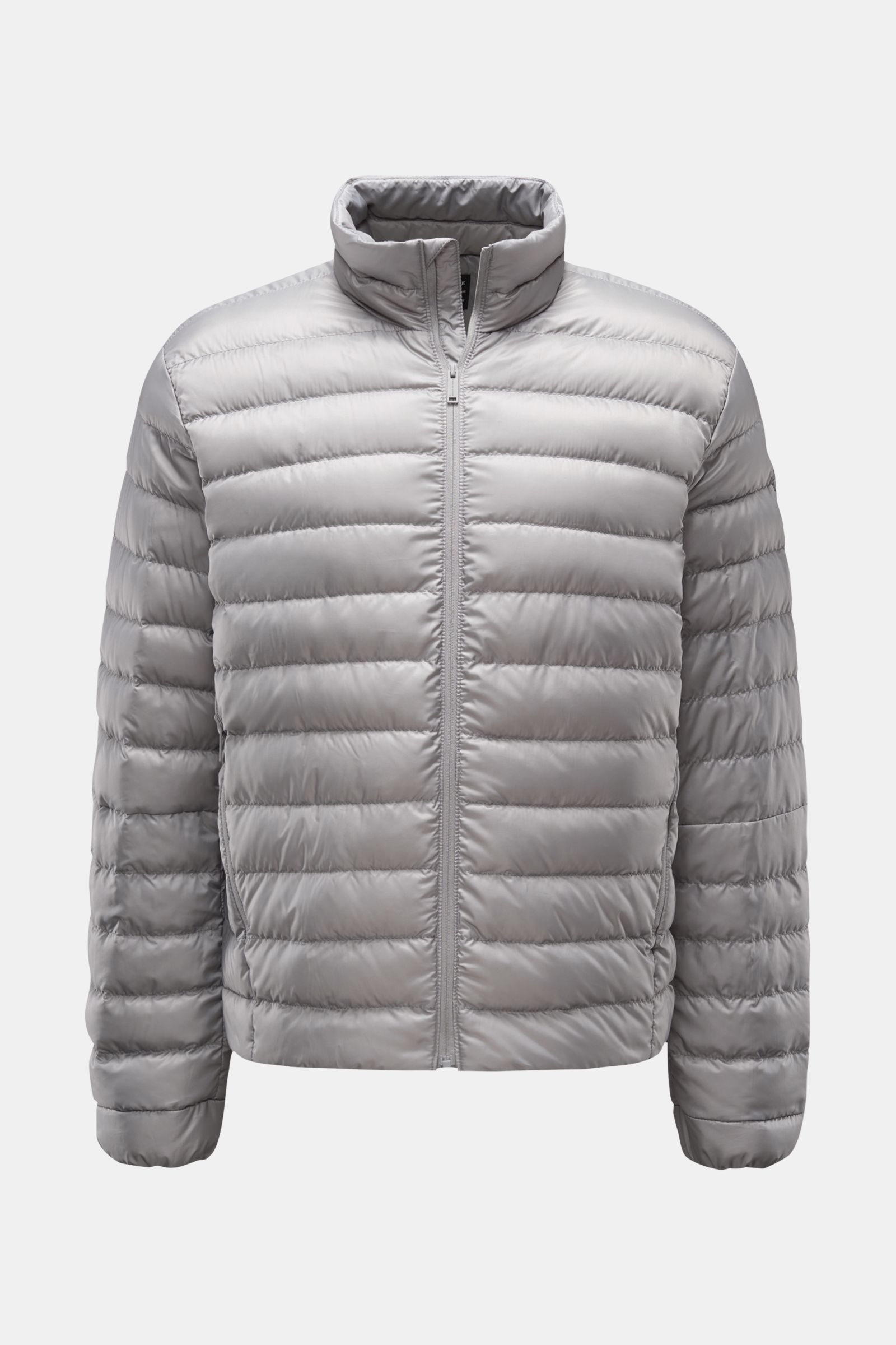 Front view of the Canada Goose Down jacket 'Stratus Tonal' light grey, a super lightweight, slim-fit, self-stowing down jacket with ripstop microfiber fabric, padded collar, two zip front pockets, elasticated cuffs, adjustable hem, tonal lining, and robus