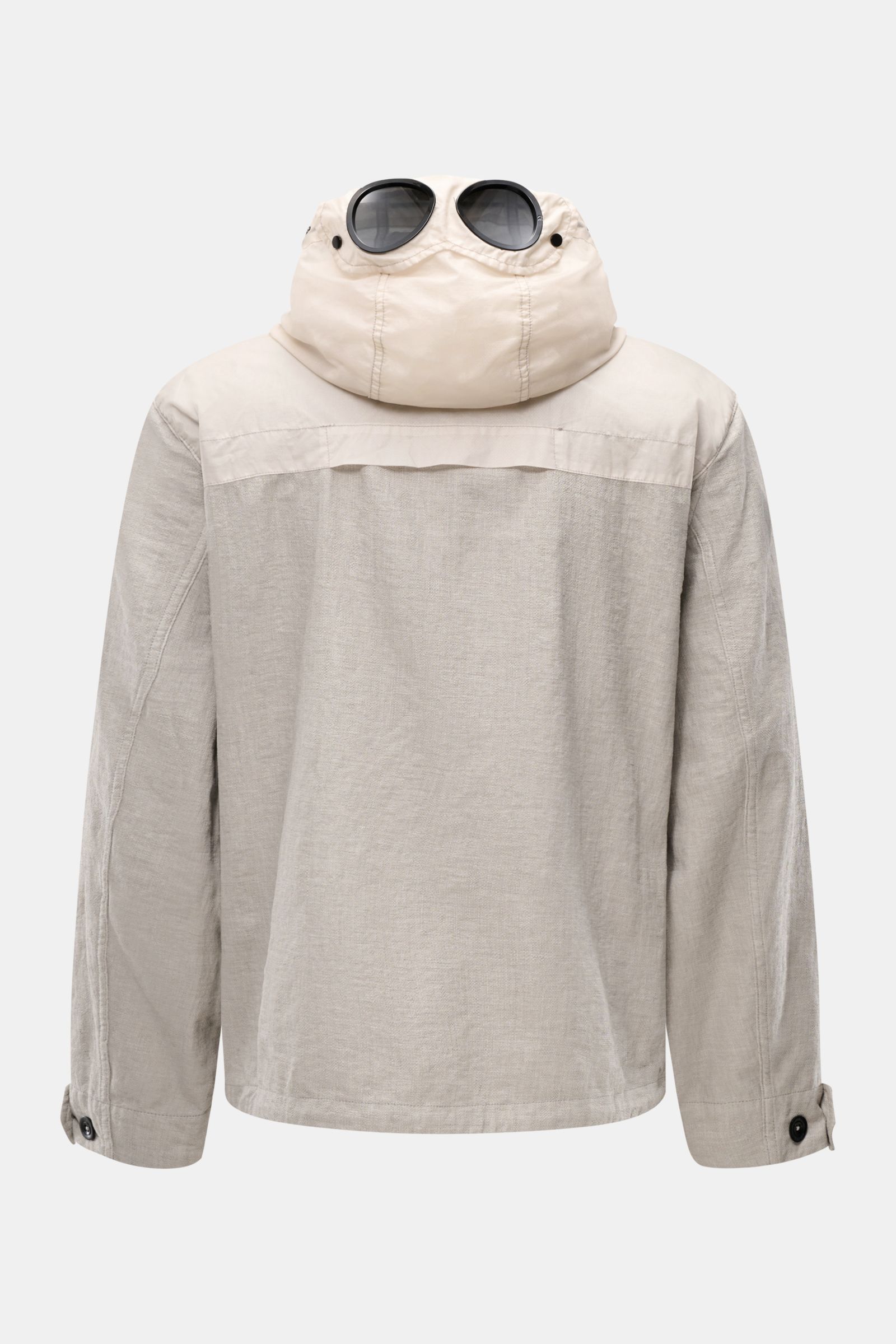 Back view of C.P. Company Jacket 'Goggle Jacket' grey, showing detachable hood with integrated goggle lenses, textured microfibre, regular fit.

Description: Signature design from C.P. COMPANY: The 'Goggle Jacket' makes a futuristic statement with its 
