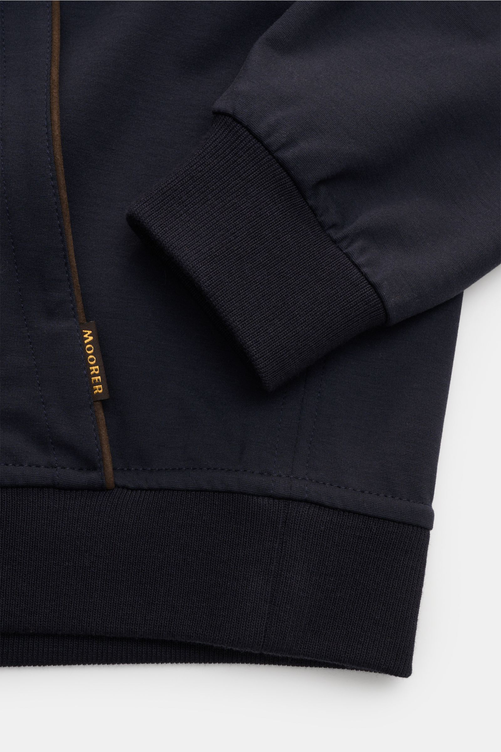 Close-up front view of Moorer Sweat jacket 'Matthew Felpa' navy showing slim fit, soft double-sided knit, ribbed bands, and brown leather jetted pocket detail.