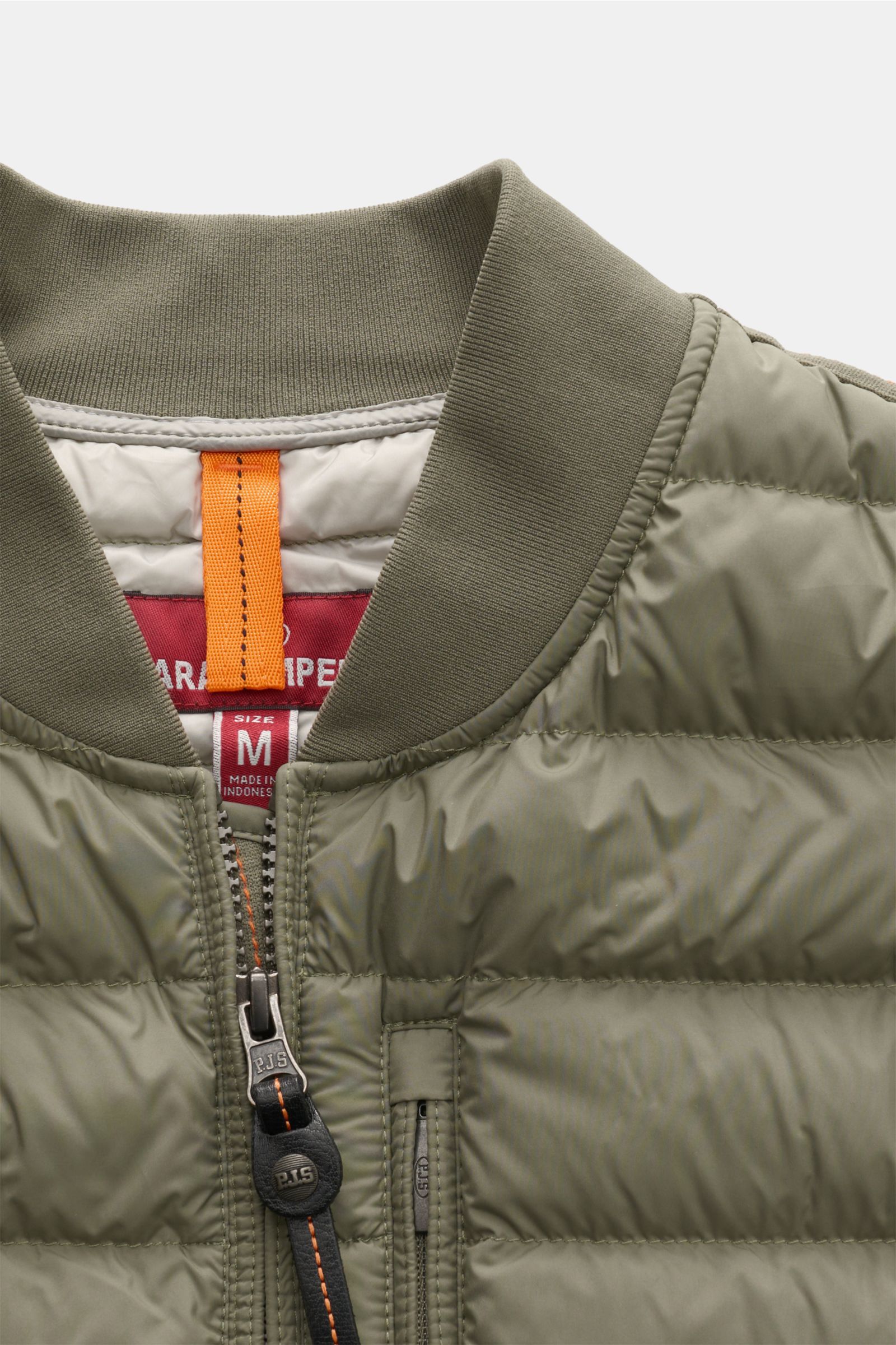 Close-up front view of the Parajumpers Down blouson 'Breving' sage, showing the high-quality microfibre, rib knit collar, robust two-way zip with leather pull, and padded design. Style meets function: This down blouson by PARAJUMPERS keeps you comfortably